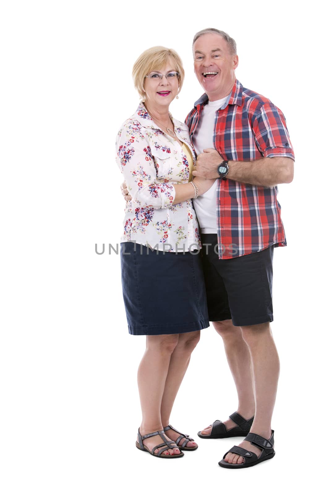 retired couple wearing casual outfits on white isolated background