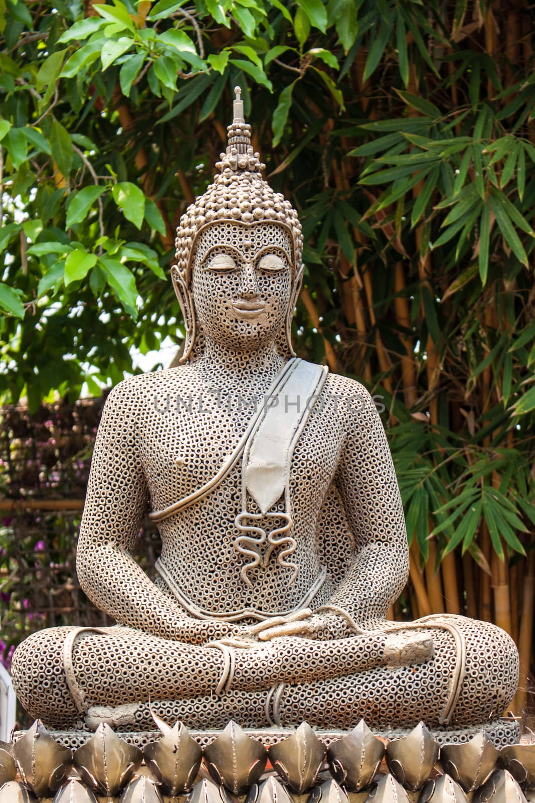 Buddha posture meditation made form old nut by worrayuth