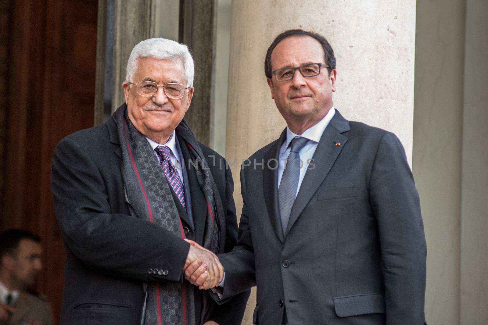 FRANCE, Paris : French President Francois Hollande (R) shakes hands with Palestinian president Mahmud Abbas (L) before their meeting at the Elysee Palace in Paris on April 16, 2016. Palestinian president Mahmud Abbas holds talks with French President Francois Hollande during his international tour seeking a UN resolution on Israeli settlements.