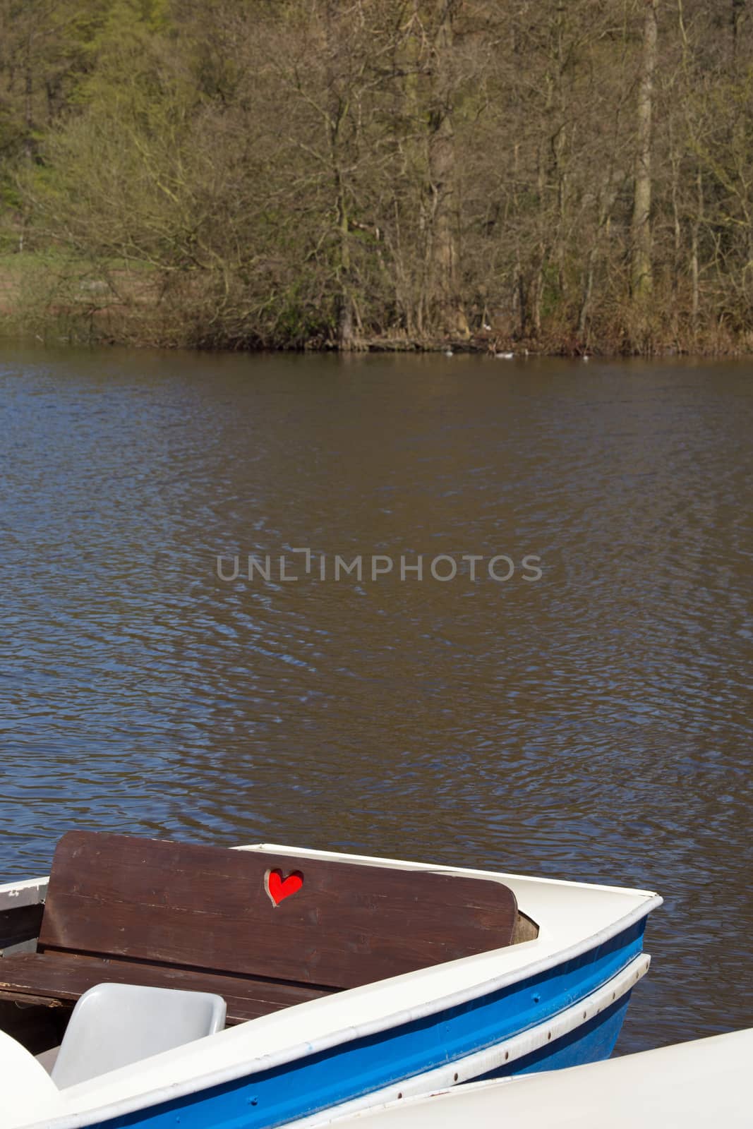 Pedalo boat with heart on a lake