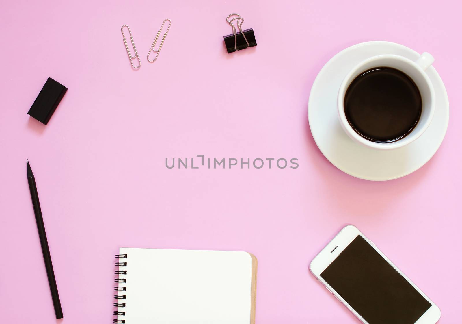 Creative header design mockup set of workspace desk with smartphone, coffee, stationery and notebook with copy space background

