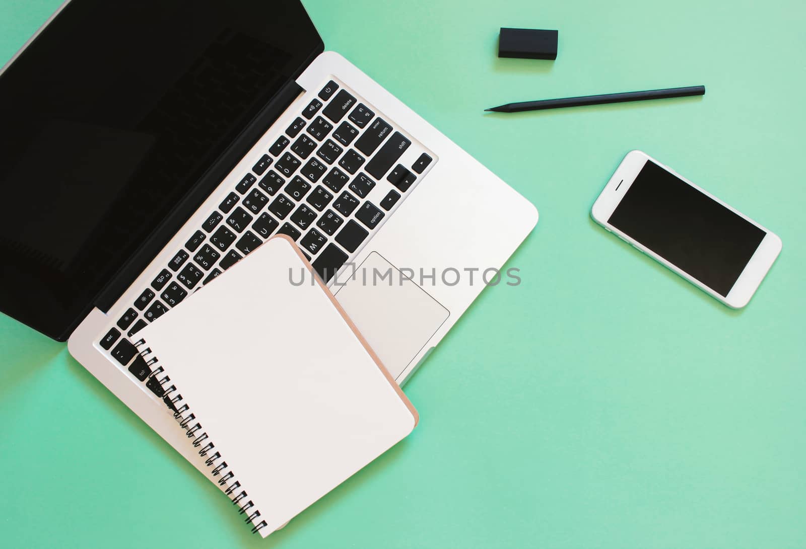 Creative flat lay design of workspace desk with laptop, blank no by nuchylee