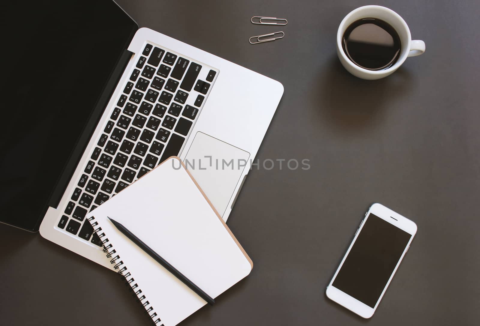 Creative flat lay design of workspace desk with laptop, notebook by nuchylee