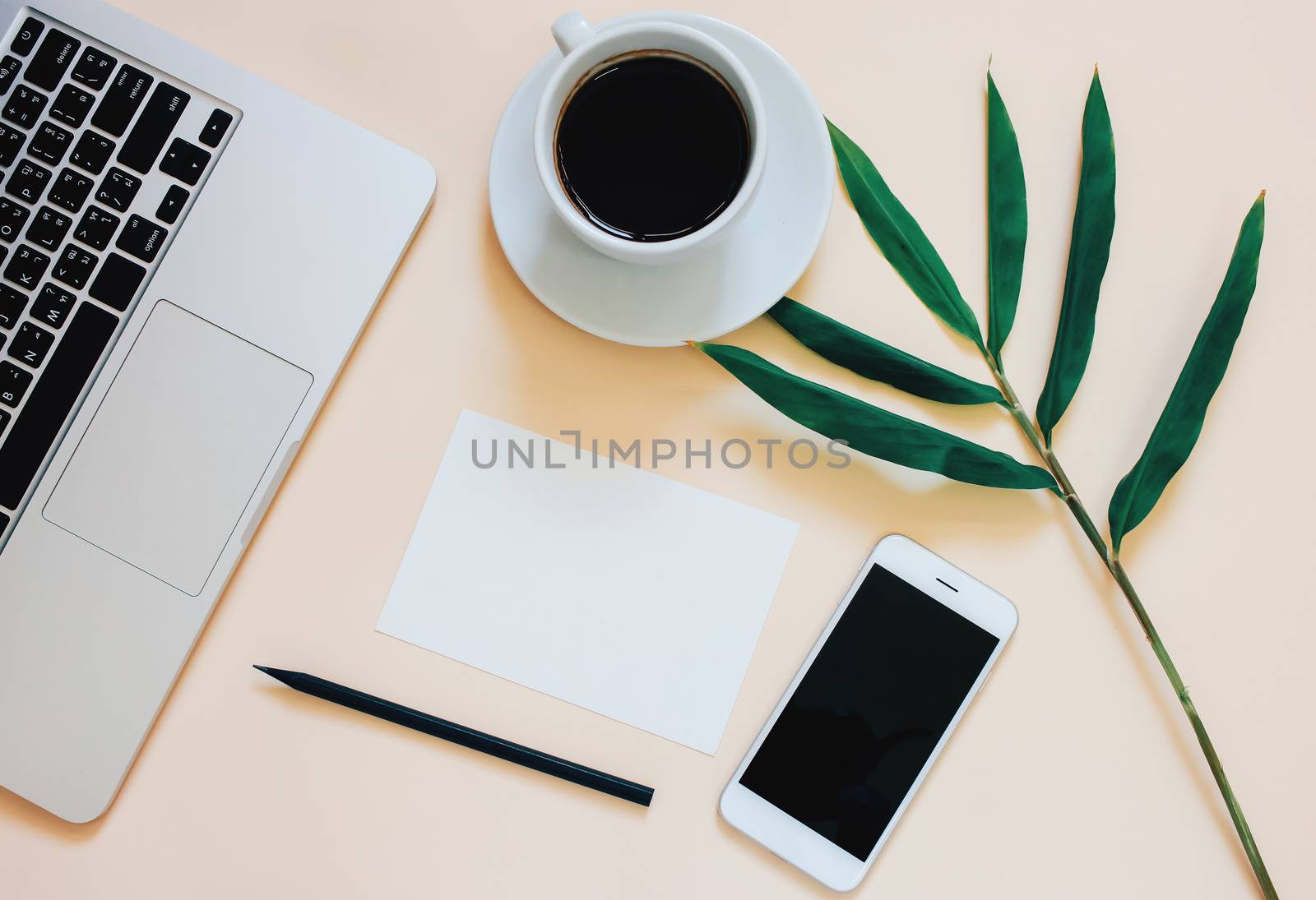 Creative flat lay photo of workspace desk with laptop, smartphon by nuchylee