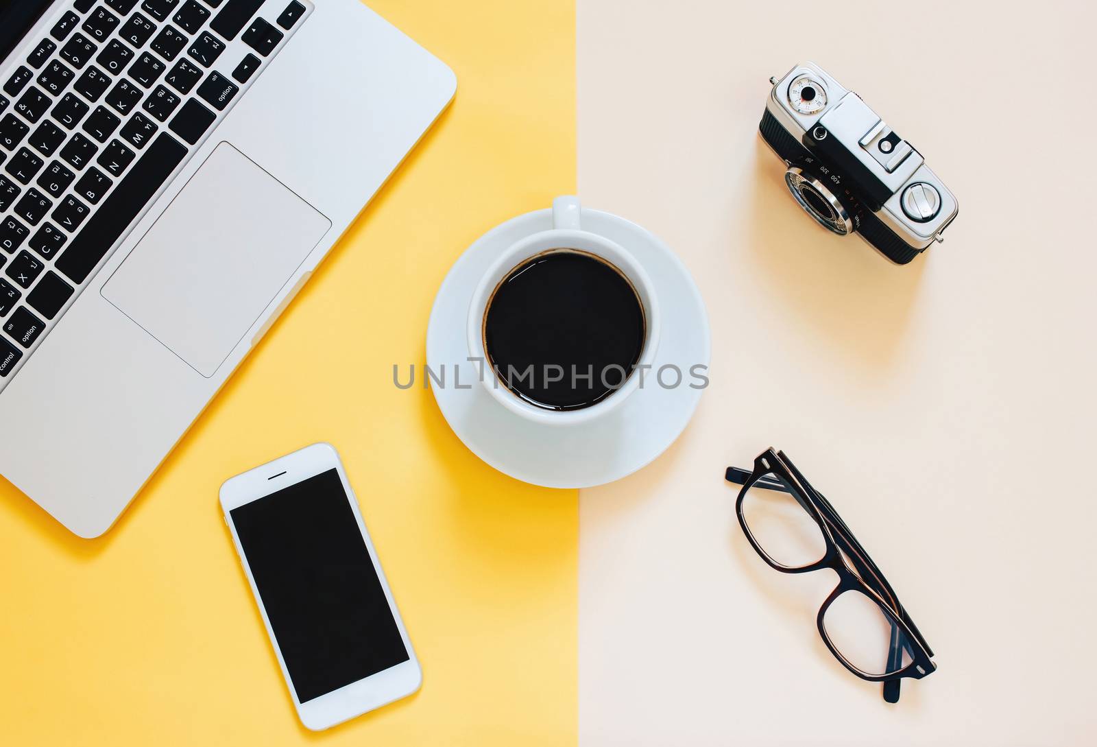 Creative flat lay photo of workspace desk with laptop, smartphon by nuchylee
