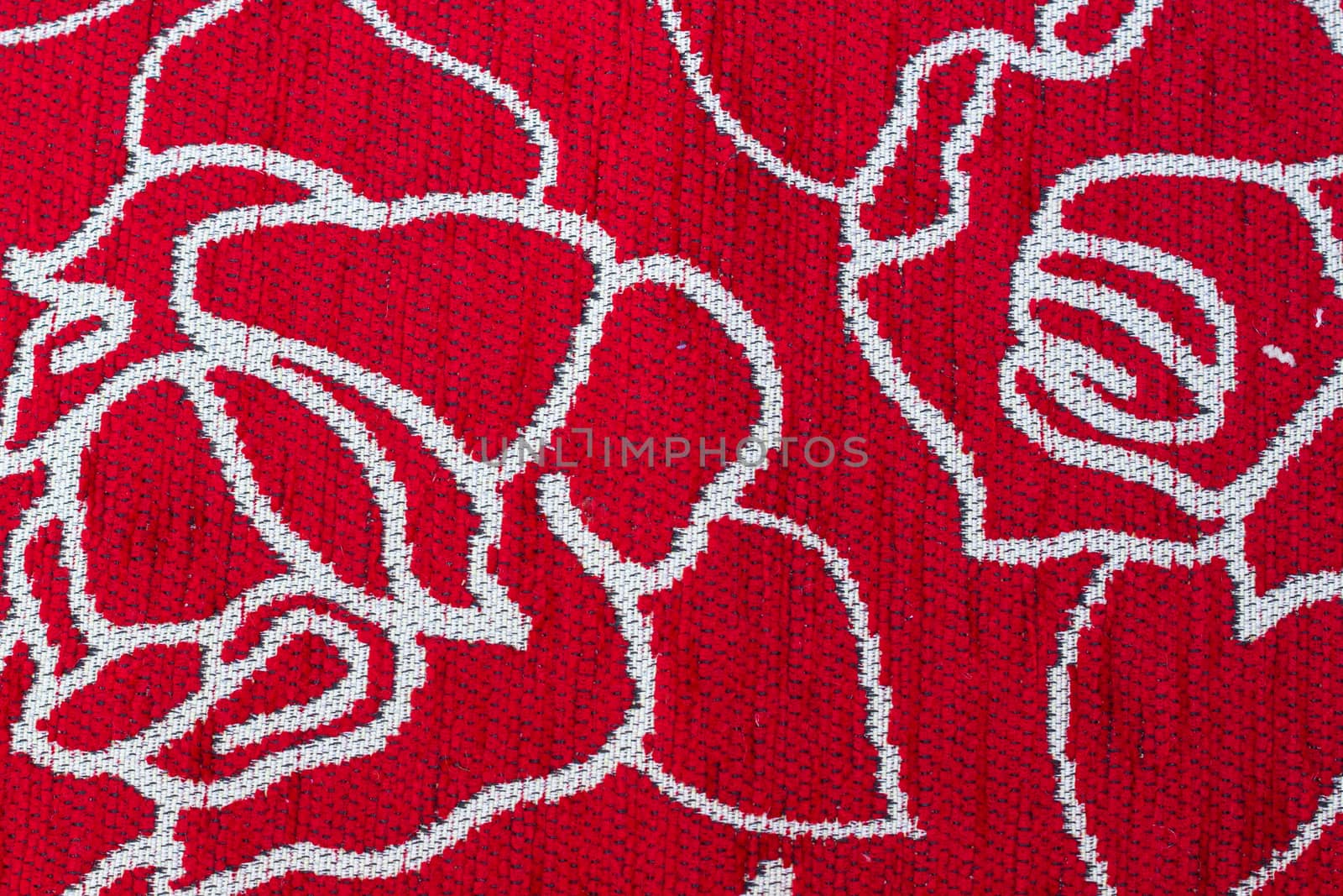 Rustic canvas fabric texture in red color.