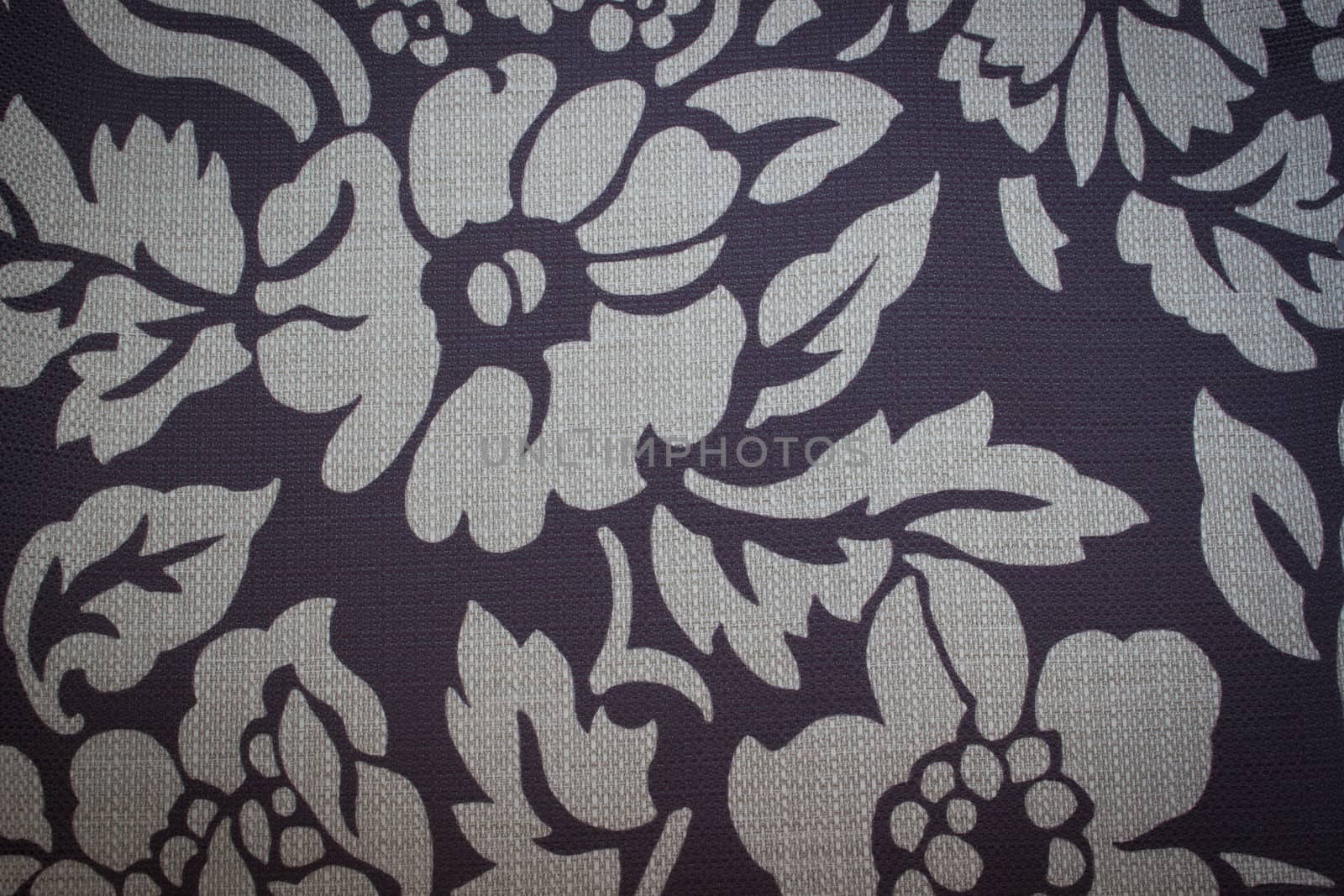 Rustic canvas fabric texture in purple color.