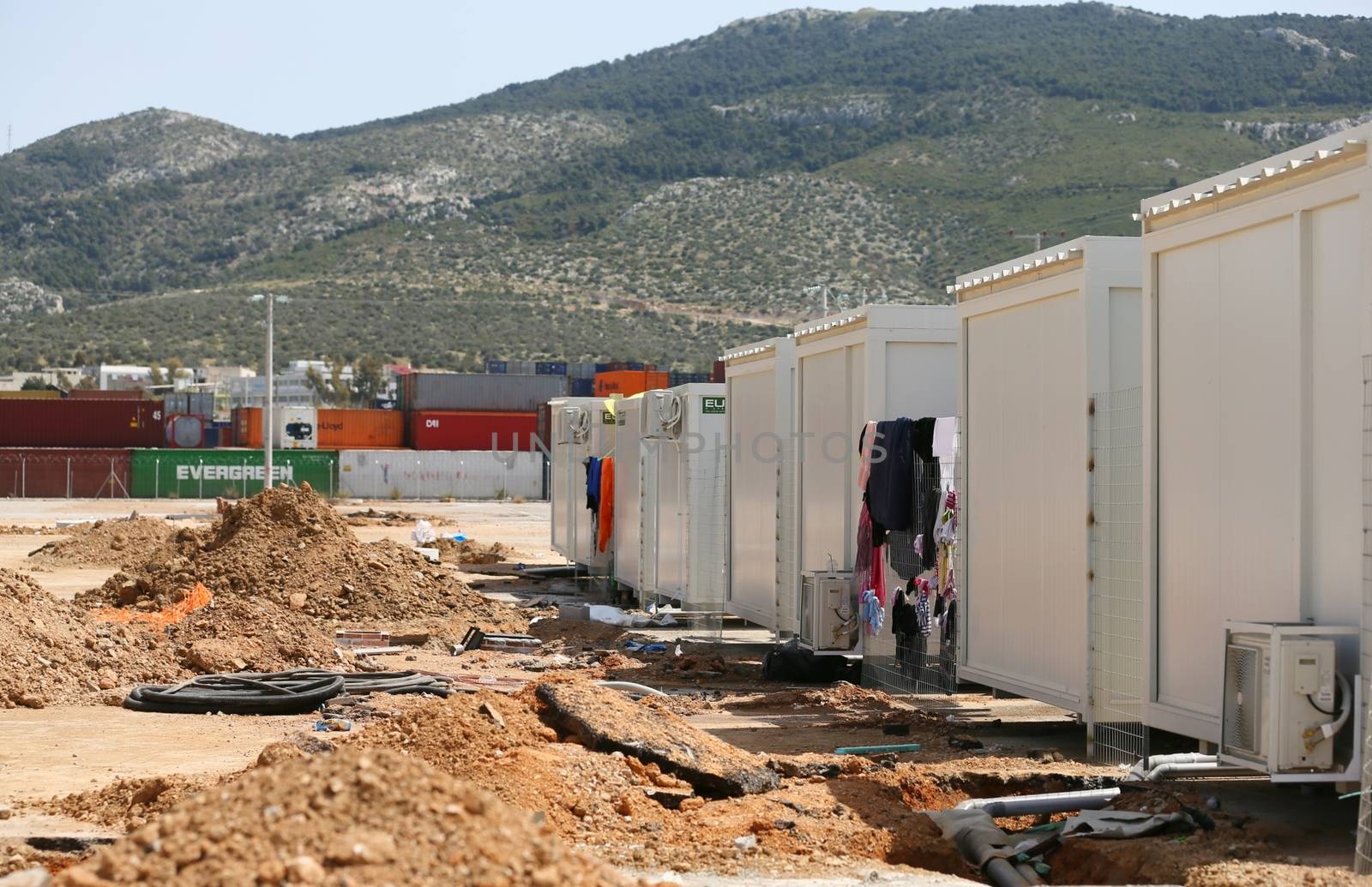 GREECE, Athens: The rolling hillsides of Greece west of Athens are the backdrop to Skaramagas camp, just off the Gulf of Eleusina on April 14, 2016.