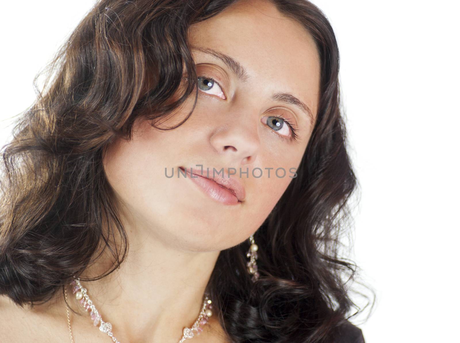 Close-up Portrait of a 30 years old woman isolated on white
