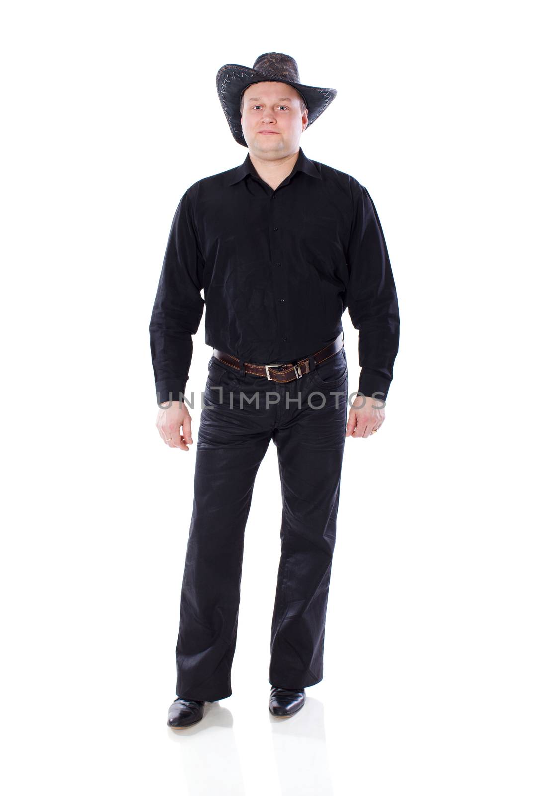 man wearing hat of cowboy standing isolated on white