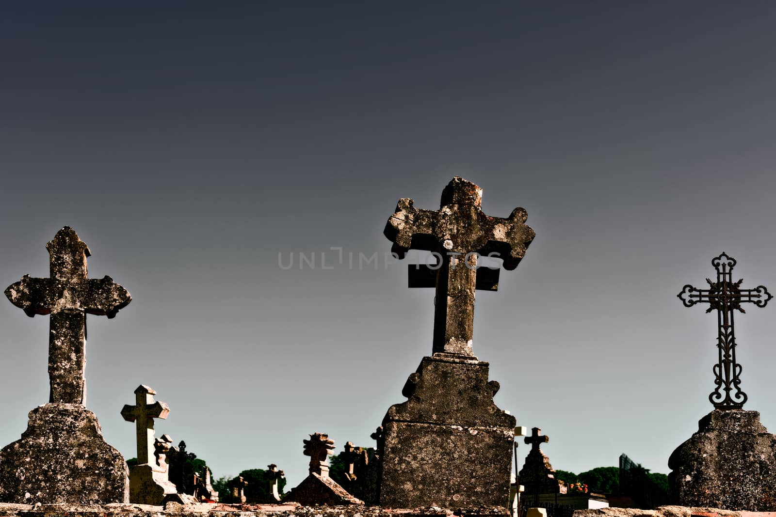 Stone Crosses in French Catholic Cemetery, Vintage Style Toned Picture