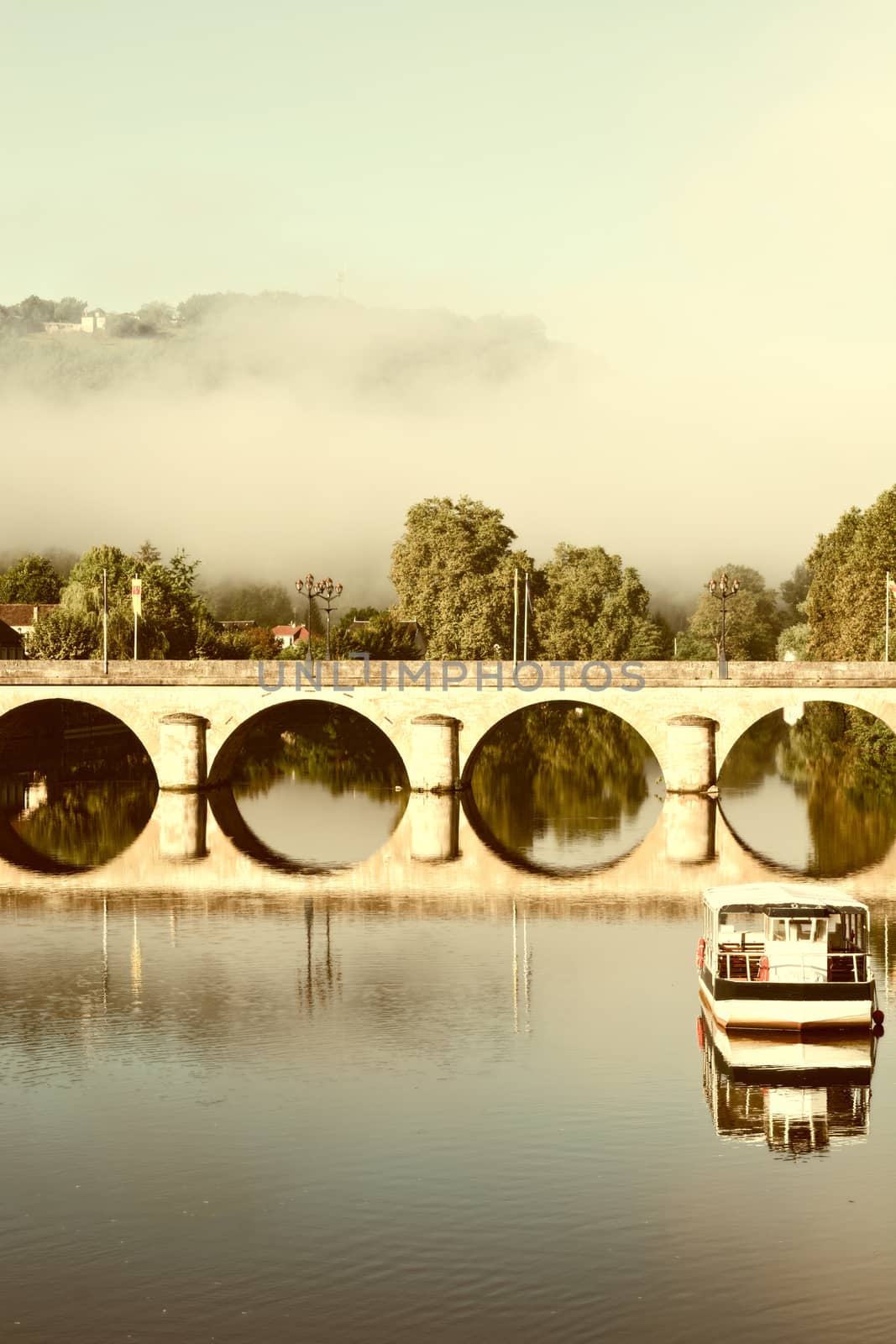 Morning Mist in the French City of Terrasson, Vintage Style Toned Picture 