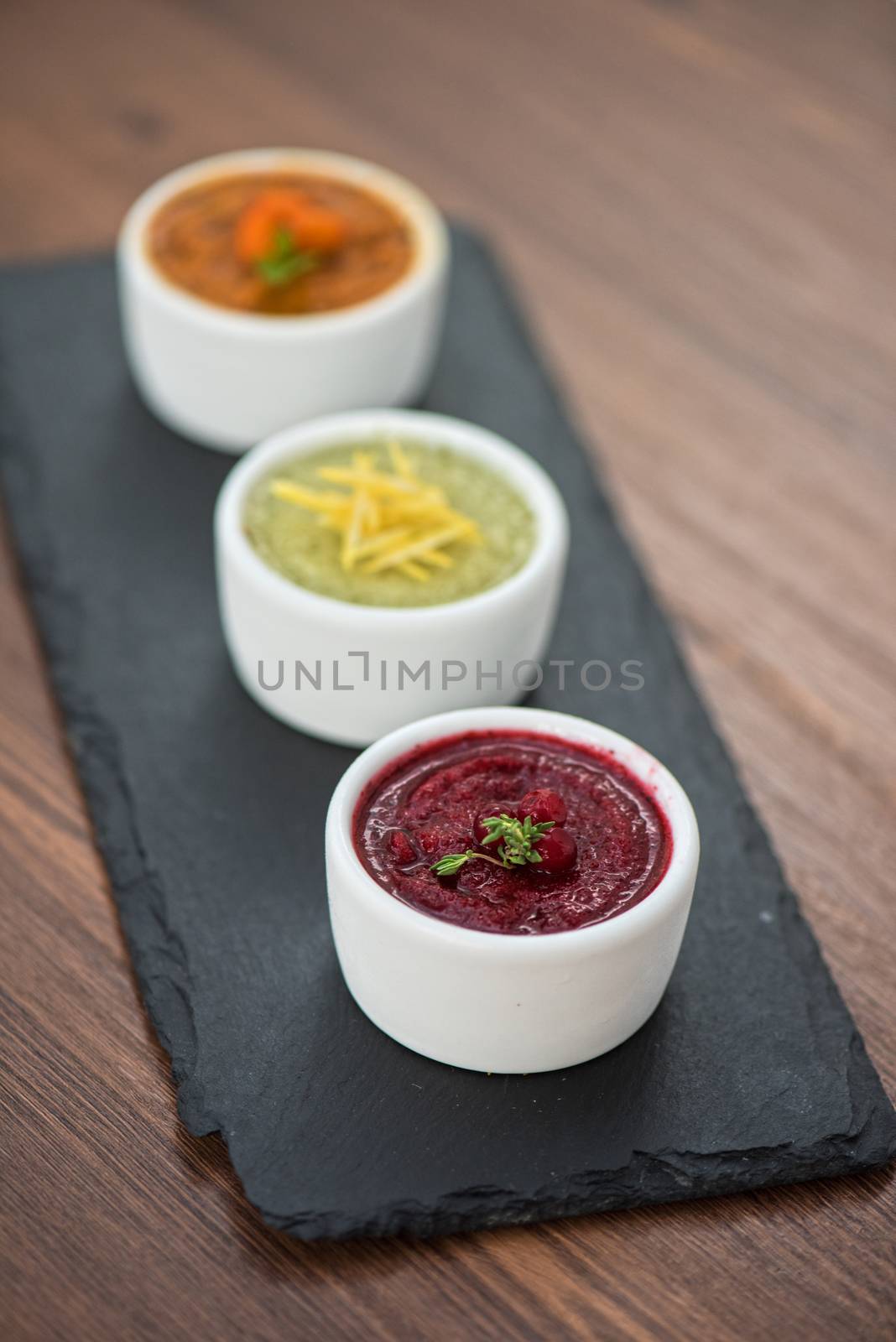 Refreshing lemon cranberry seabuckthorn sorbet at white bowl