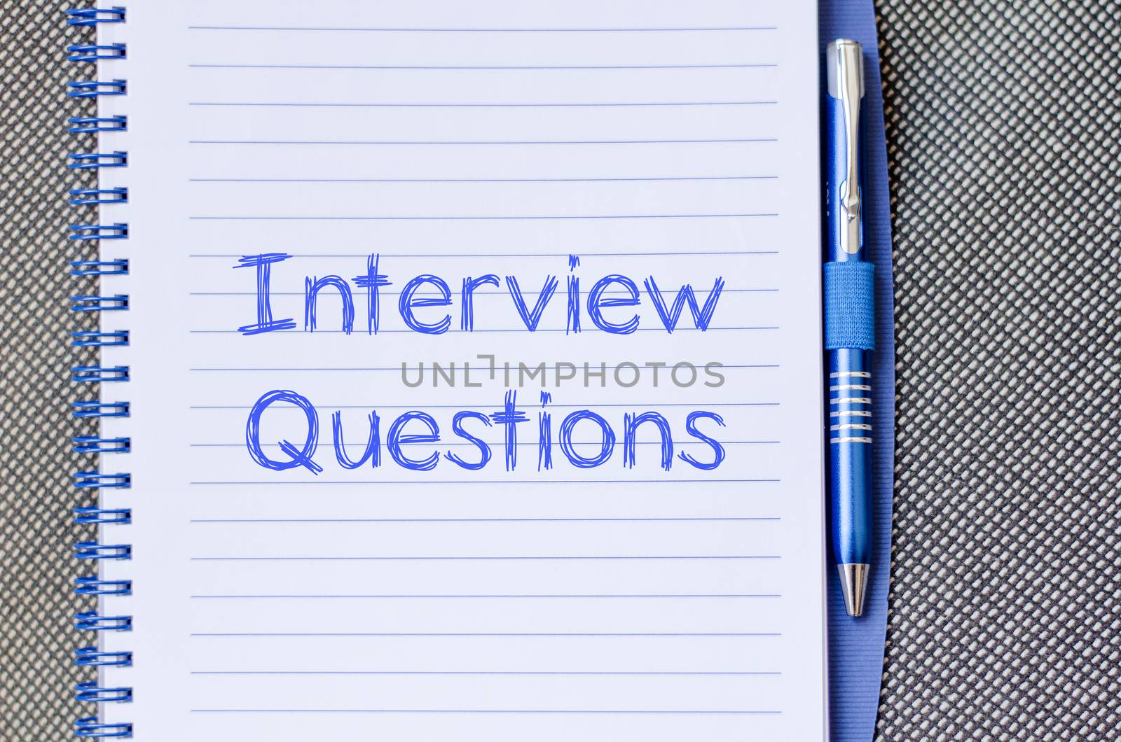 Interview questions text concept write on notebook