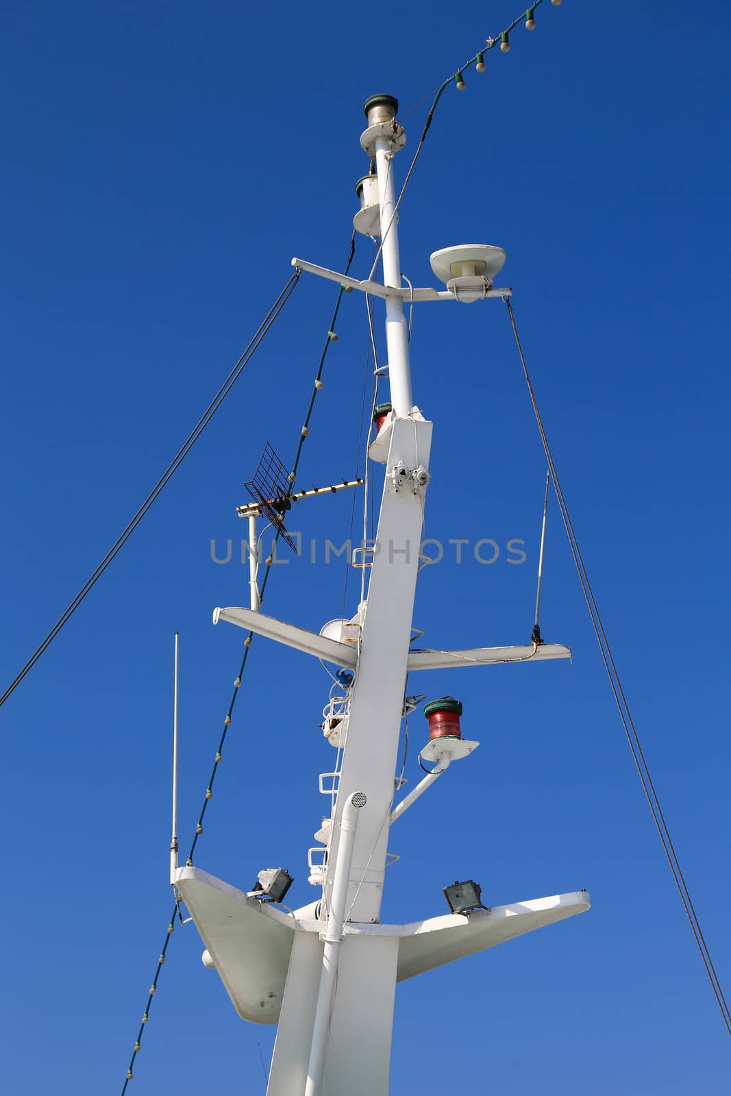 Mast of a ferry and a blue sky