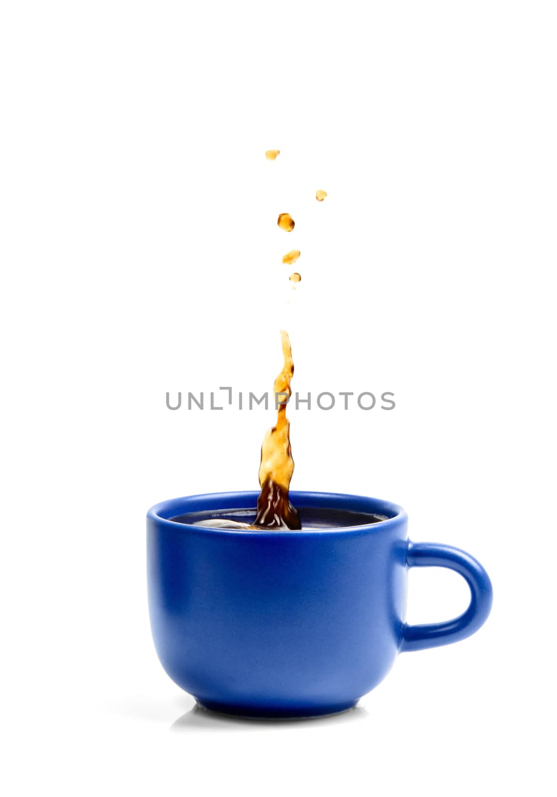 Blue porcelain cup isolated on white backgorund and fresh tasty splashing coffee.