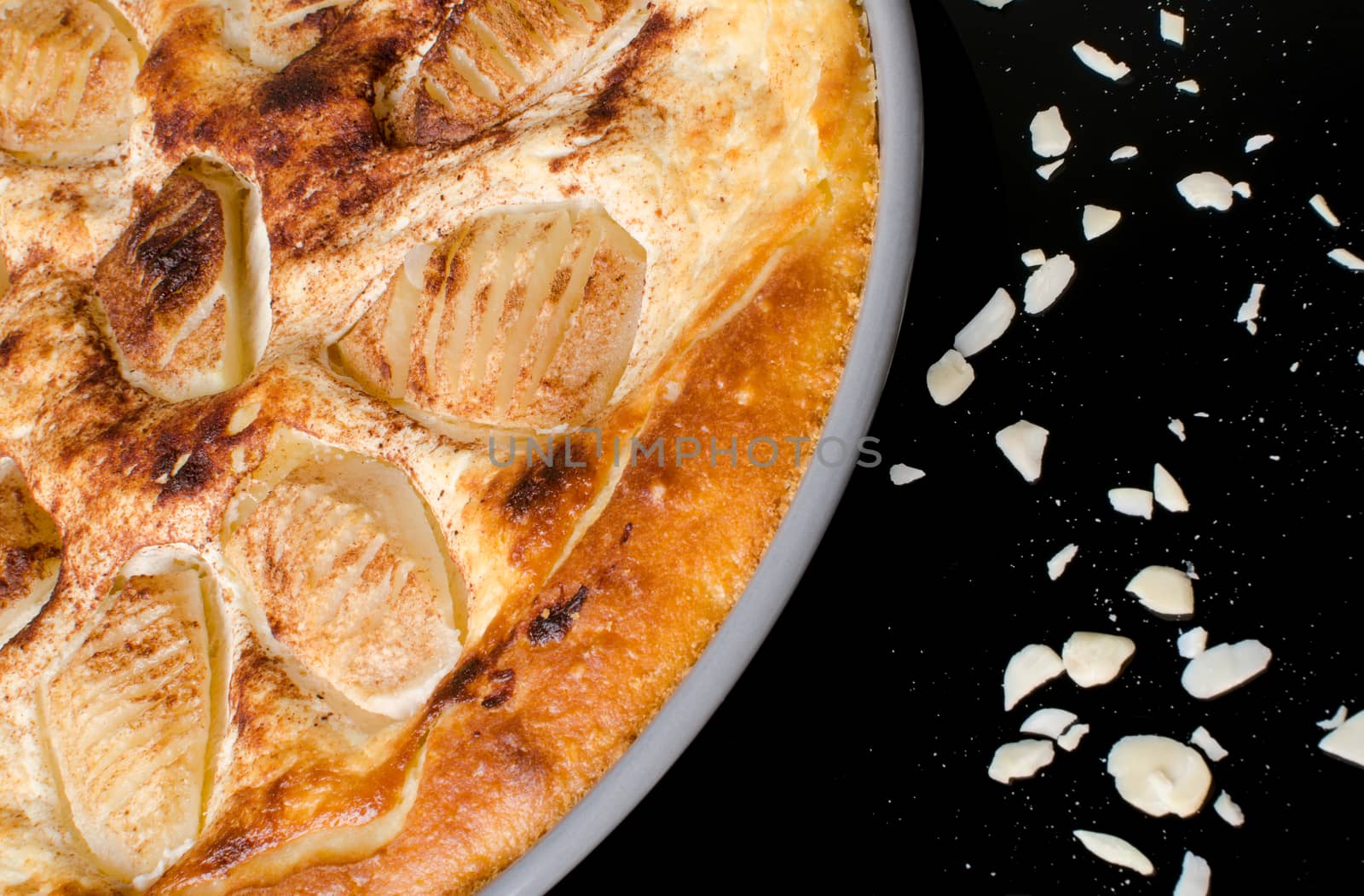 Sweet tasty pear pie isolated on black background