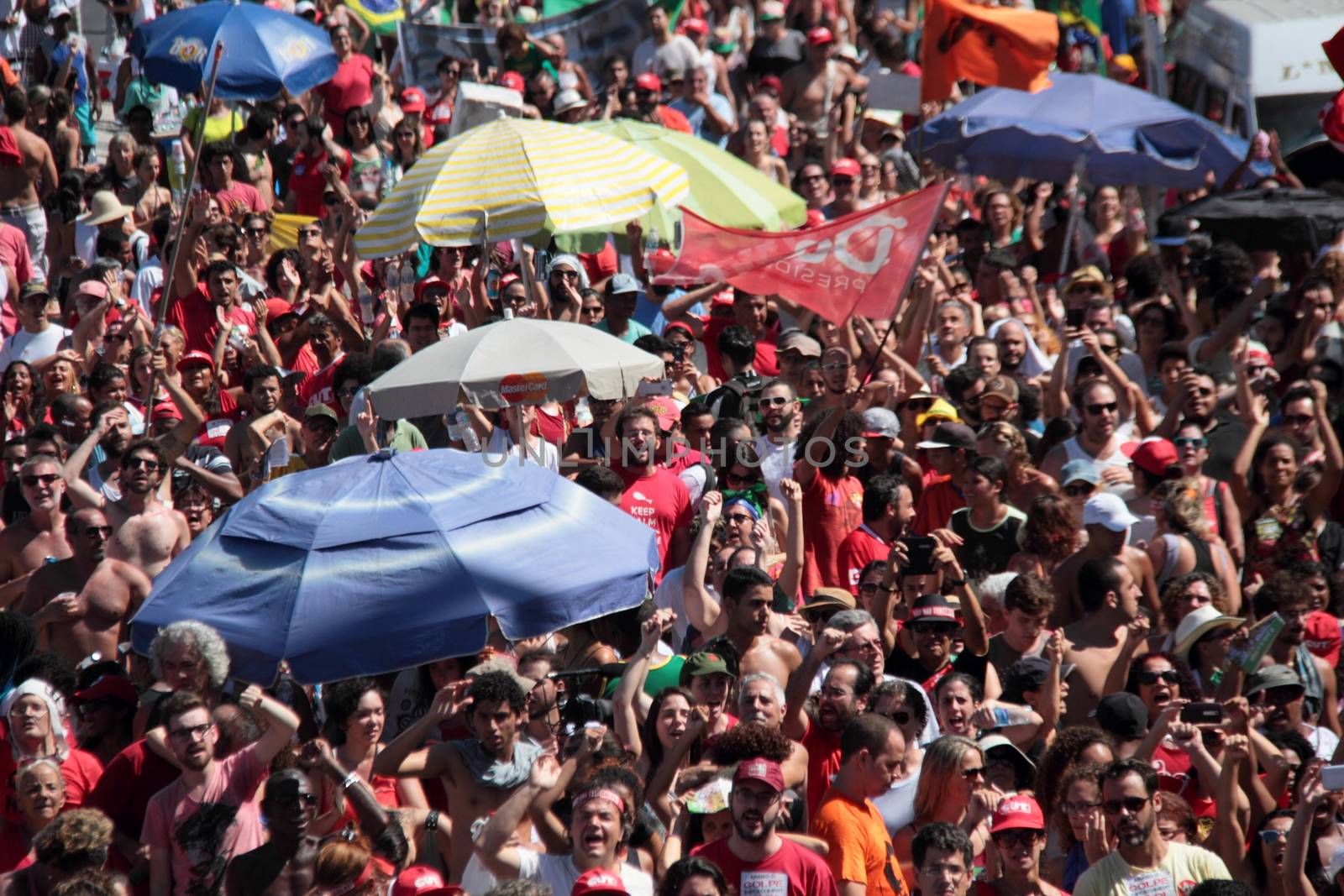 BRAZIL, Rio de Janeiro: Thousands of protesters marched at a rally at Copacabana Beach in Rio de Janeiro, Brazil on April 17, 2016, against the impeachment of President Dilma Rousseff. Rousseff faces an impeachment vote today over charges of manipulating government accounts. Brazil's lower house is voting on whether to continue impeachment proceedings. 342 out of 513 votes are needed to continue the proceedings to the upper house.