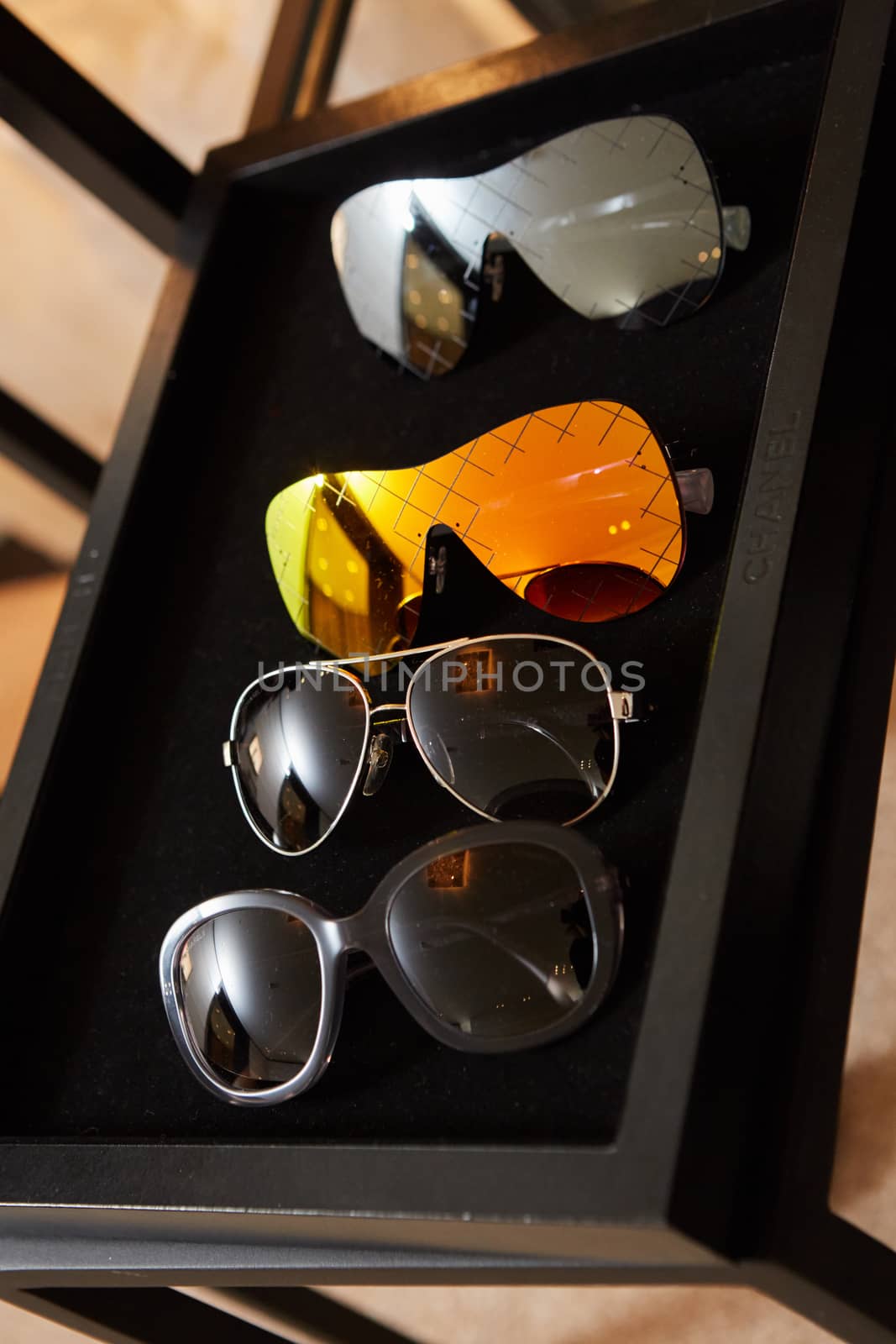 The collection of luxury sunglasses in boutique 