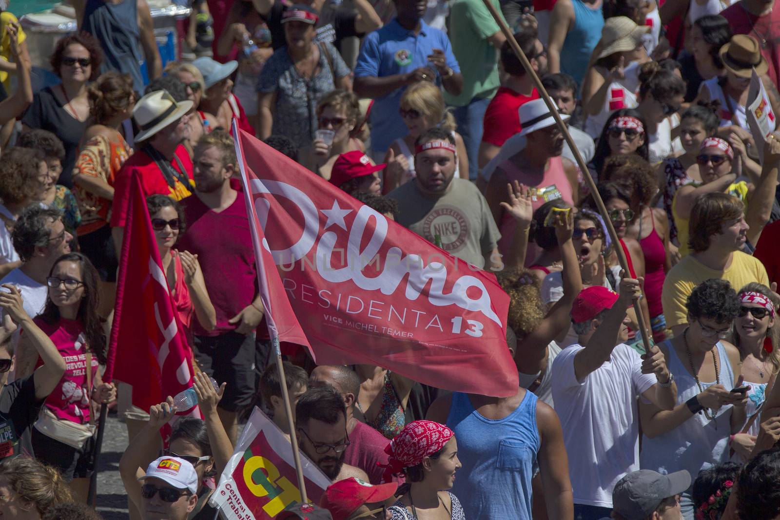 BRAZIL, Rio de Janeiro: A protester waves a Dilma flag at a pro-Rousseff march in Rio de Janeiro, Brazil on April 17, 2016.Rousseff faces an impeachment vote today over charges of manipulating government accounts. Brazil's lower house is voting on whether to continue impeachment proceedings. 342 out of 513 votes are needed to continue the proceedings to the upper house.