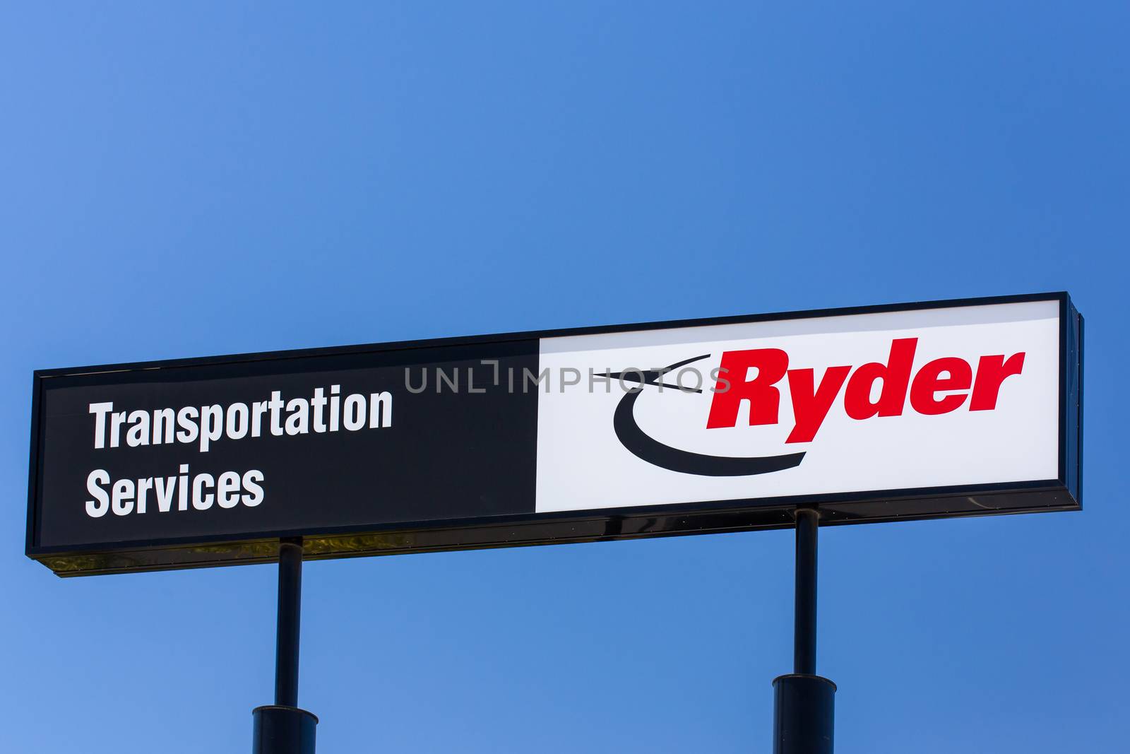 SANTA FE SPRINGS, CA/USA - APRIL 16, 2016: Ryder Corporation sign and logo. Ryder System, Inc.is an American-based provider of transportation and supply chain management products.