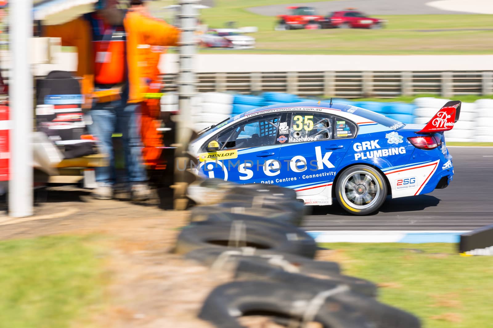 PHILLIP ISLAND, MELBOURNE/AUSTRALIA - 17 APRIL 2016: Dunlop Series race cars exiting turn 6 at Phillip Island.