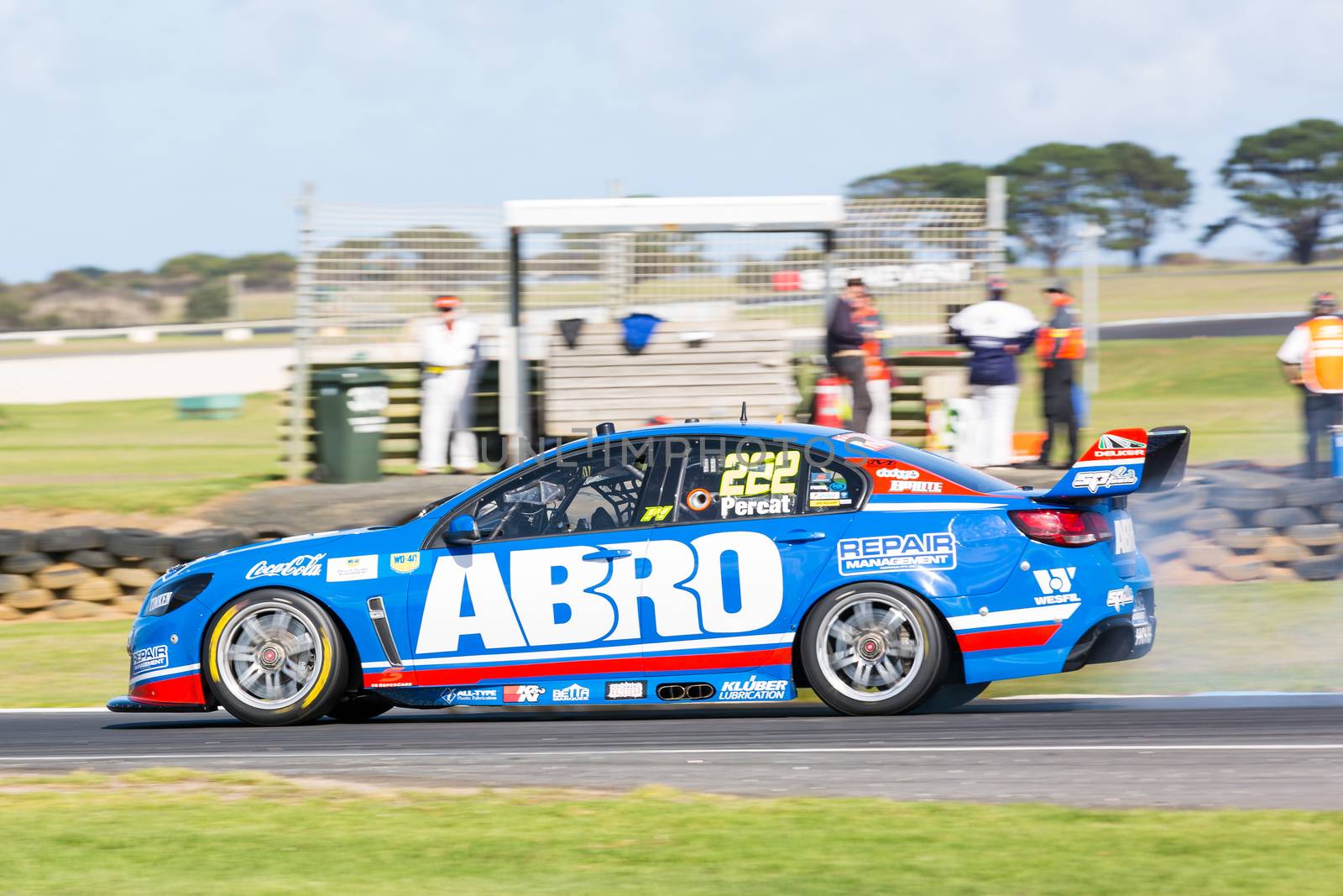 PHILLIP ISLAND, MELBOURNE/AUSTRALIA - 17 APRIL 2016: Nick Percat's Holden Commodore suffers mechanical damage coming into turn 6 at Phillip Island.