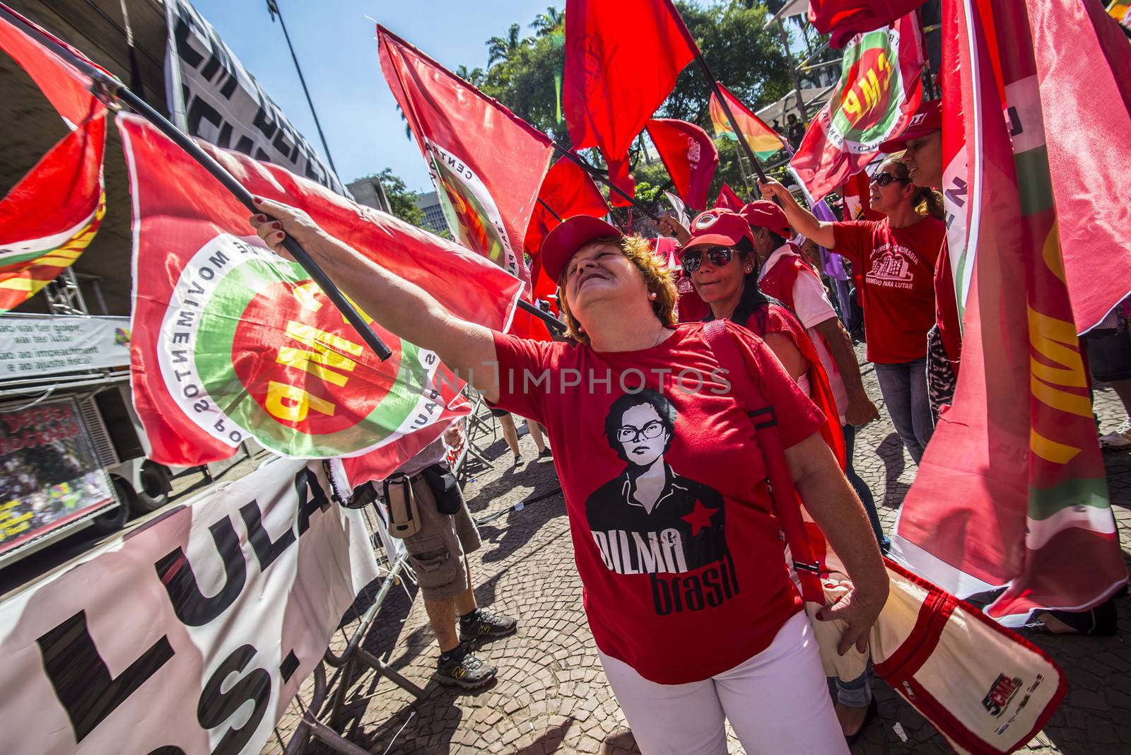 BRAZIL, Sao Paulo: Supporters of Brazilian President Dilma Rousseff demonstrate in Sao Paulo, before the voting of lawmakers at the Congress in Brasilia over the impeachment of Rousseff, on April 17, 2016. Brazilian lawmakers on Sunday reached the two thirds majority necessary to authorize impeachment proceedings against President Dilma Rousseff. The lower house vote sends Rousseff's case to the Senate, which can vote to open a trial. A two thirds majority in the upper house would eject her from office. Rousseff, whose approval rating has plunged to a dismal 10 percent, faces charges of embellishing public accounts to mask the budget deficit during her 2014 reelection.