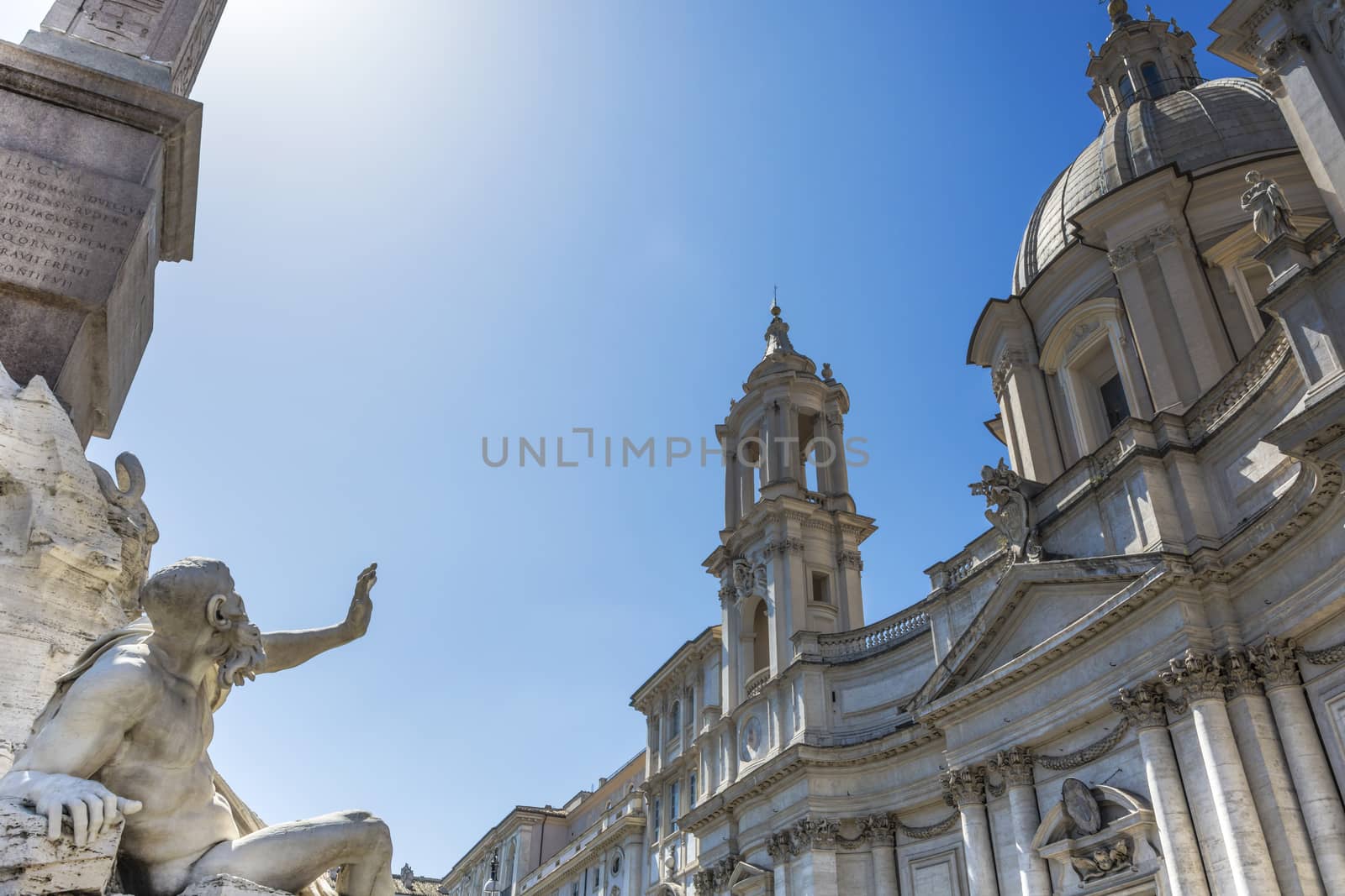 details of two roman baroque masterpiece: the four river fountain andhe the saint Agnese church in Piazza Navona in Rome