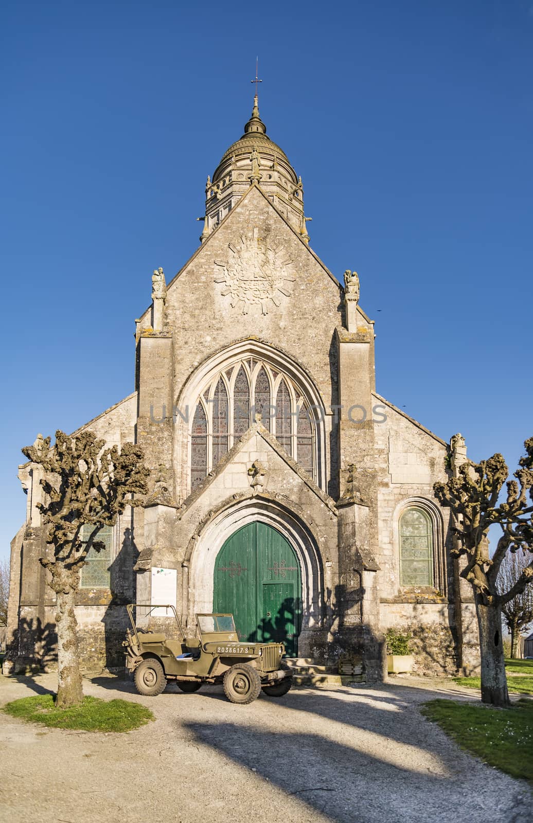 Church and america Jeep in Sainte Marie du Mont, Manche, Normandy, France