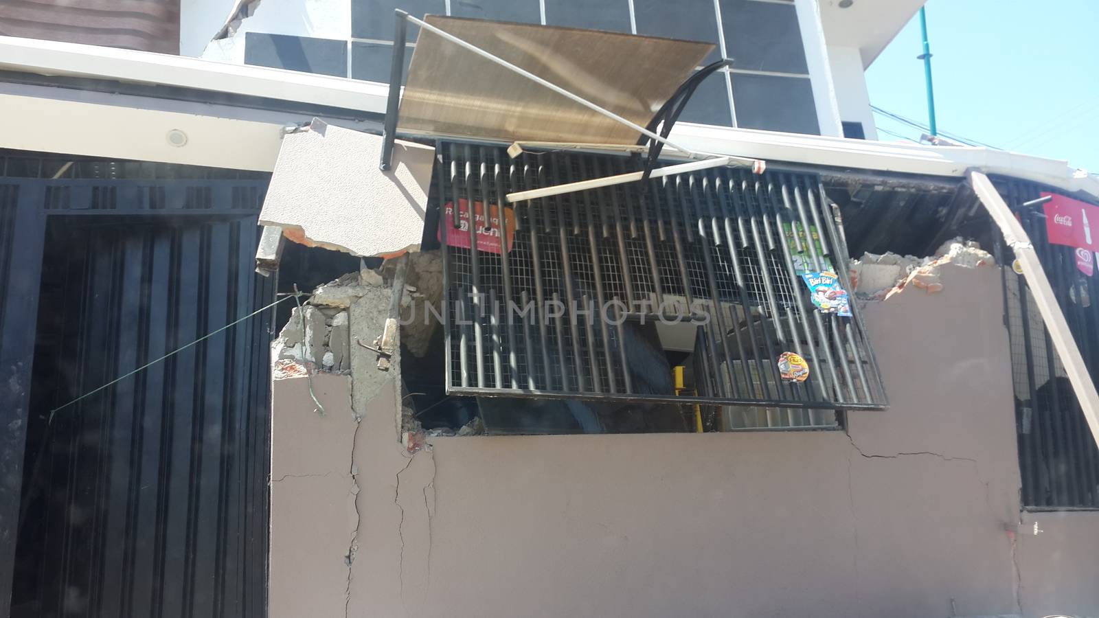 ECUADOR, Portoviejo: A building in Portoviejo, Ecuador shows heavy damage on April 17, 2016 the day after a devastating earthquake killed roughly 350 people, and counting. In Portoviejo, a prison was reportedly destroyed, allowing 100 inmates to escape. A state of emergency has been declared, and more than 13,000 soldiers and police officers have been deployed to the worst-hit areas of the country.