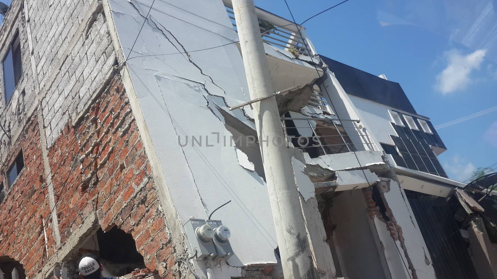 ECUADOR, Portoviejo: A building in Portoviejo, Ecuador shows heavy damage on April 17, 2016 the day after a devastating earthquake killed roughly 350 people, and counting. In Portoviejo, a prison was reportedly destroyed, allowing 100 inmates to escape. A state of emergency has been declared, and more than 13,000 soldiers and police officers have been deployed to the worst-hit areas of the country.