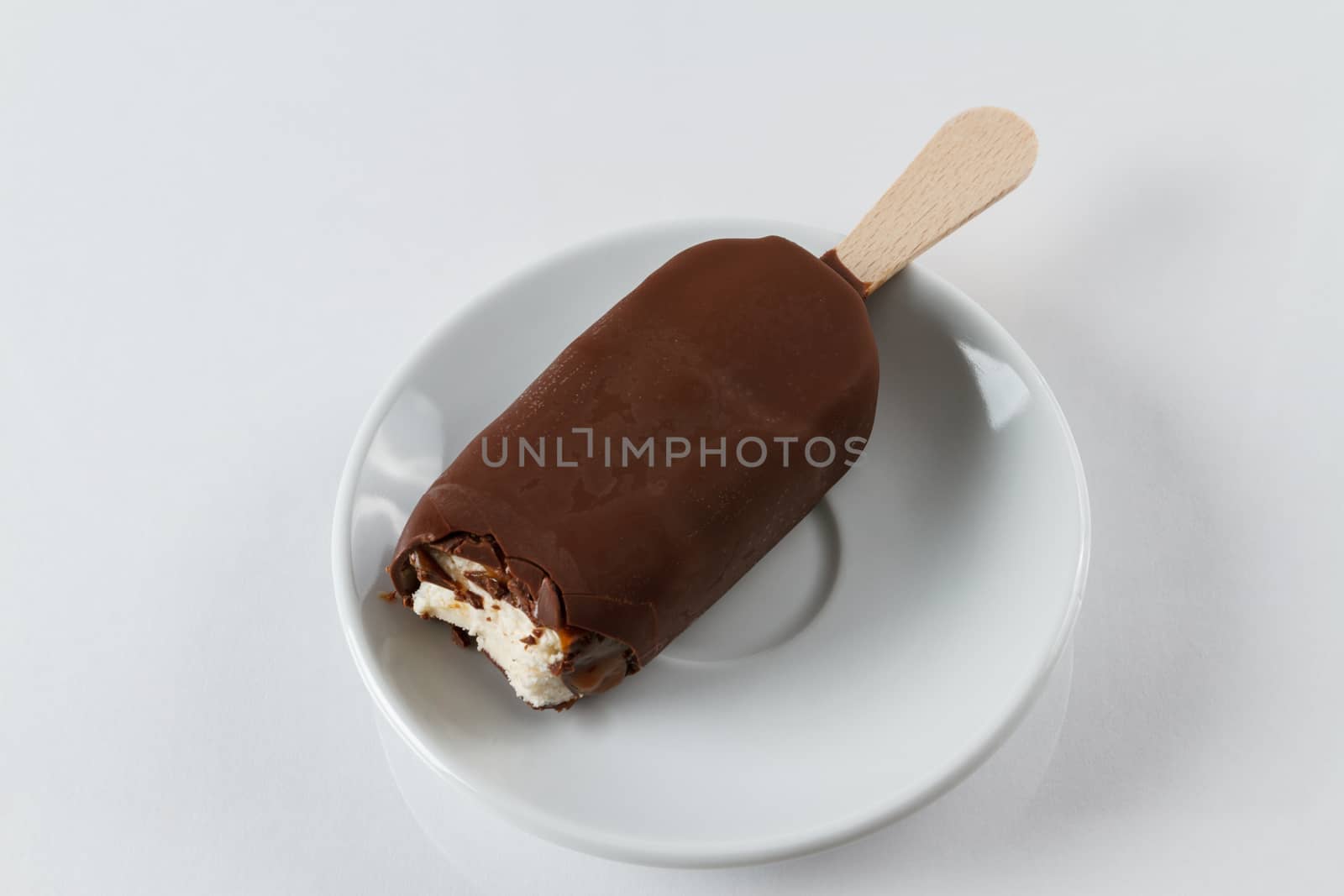 Chocolate covered vanilla and raspberry popsicle by lprising