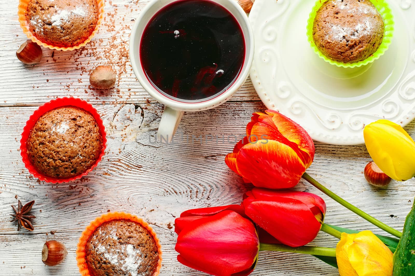 muffin tins and bouquet of fresh cut tulips