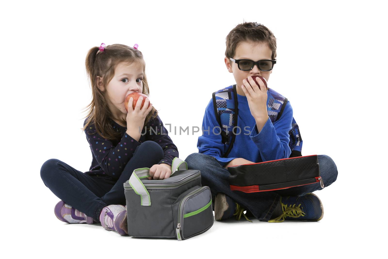school children having their lunch on white isolated background