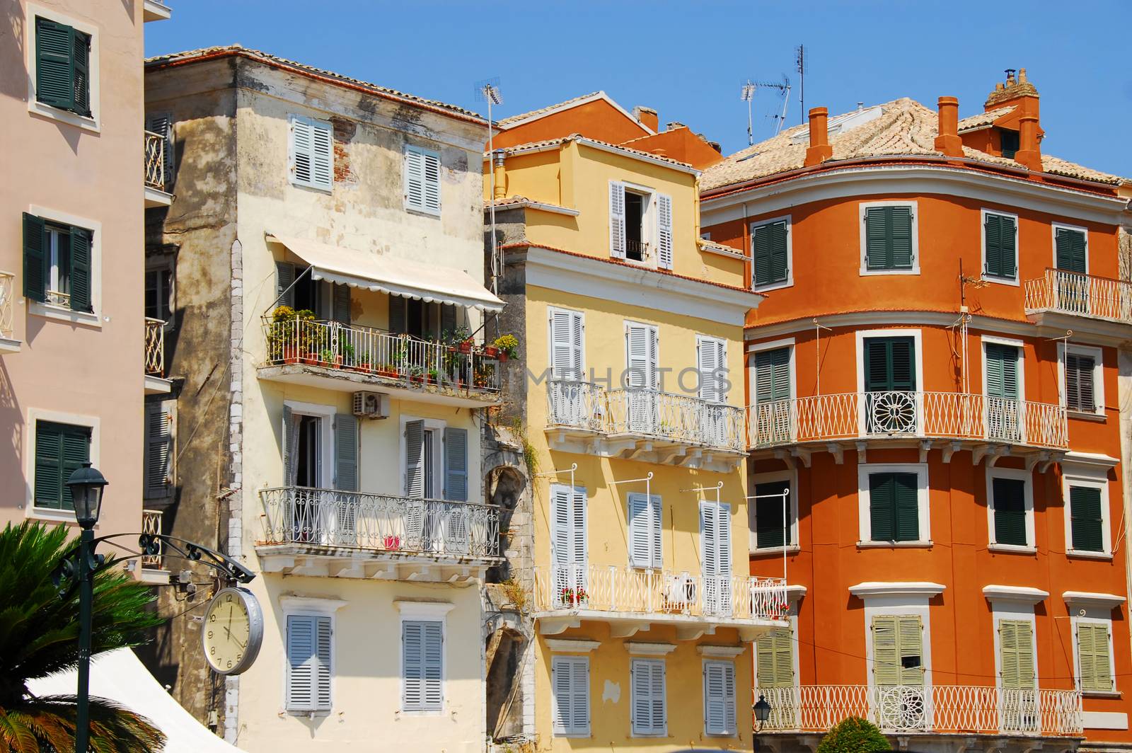 colorful buildings on Greek island Corfu at sunlight
