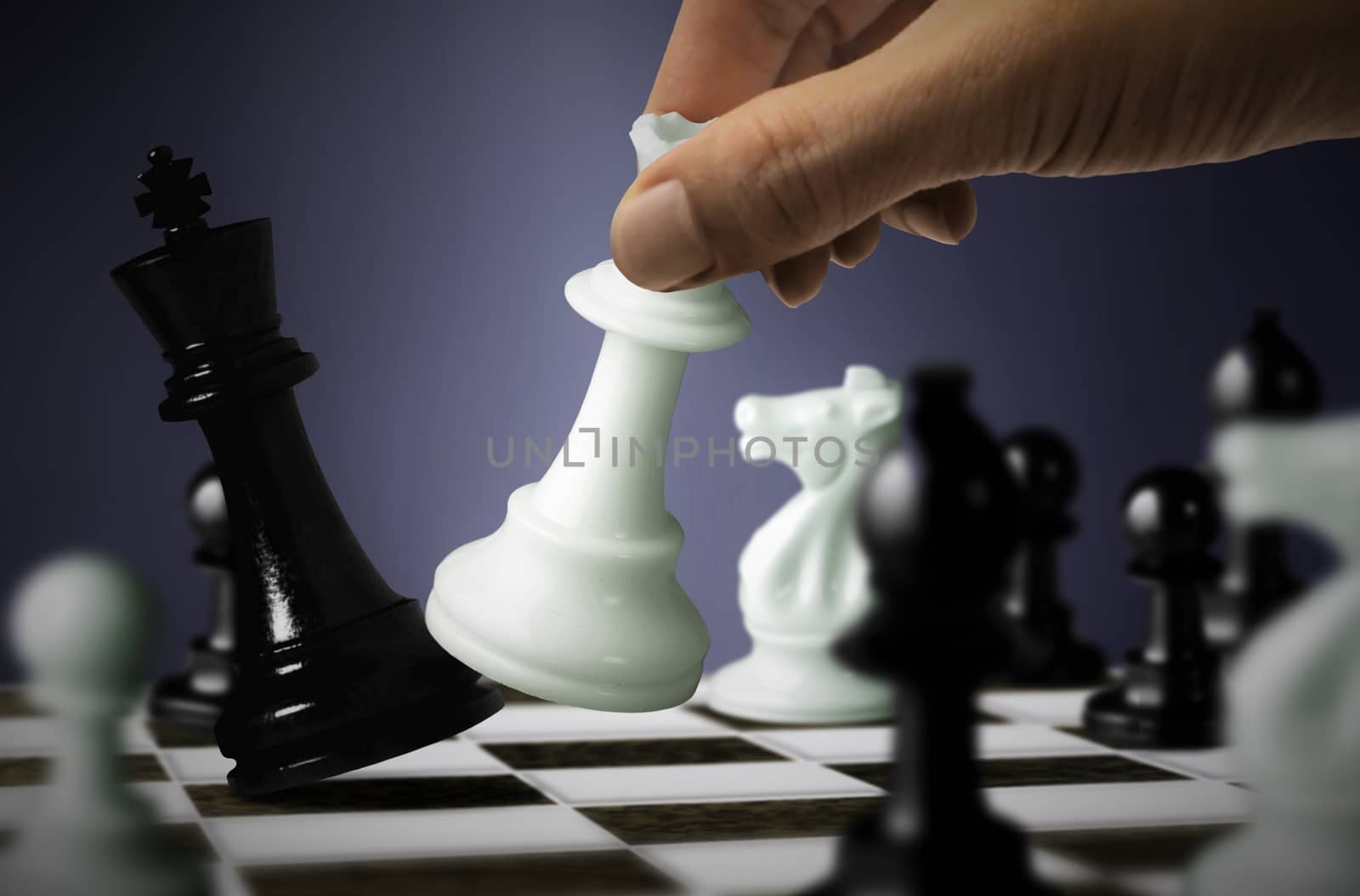 Chess game with King checkmate by Queen