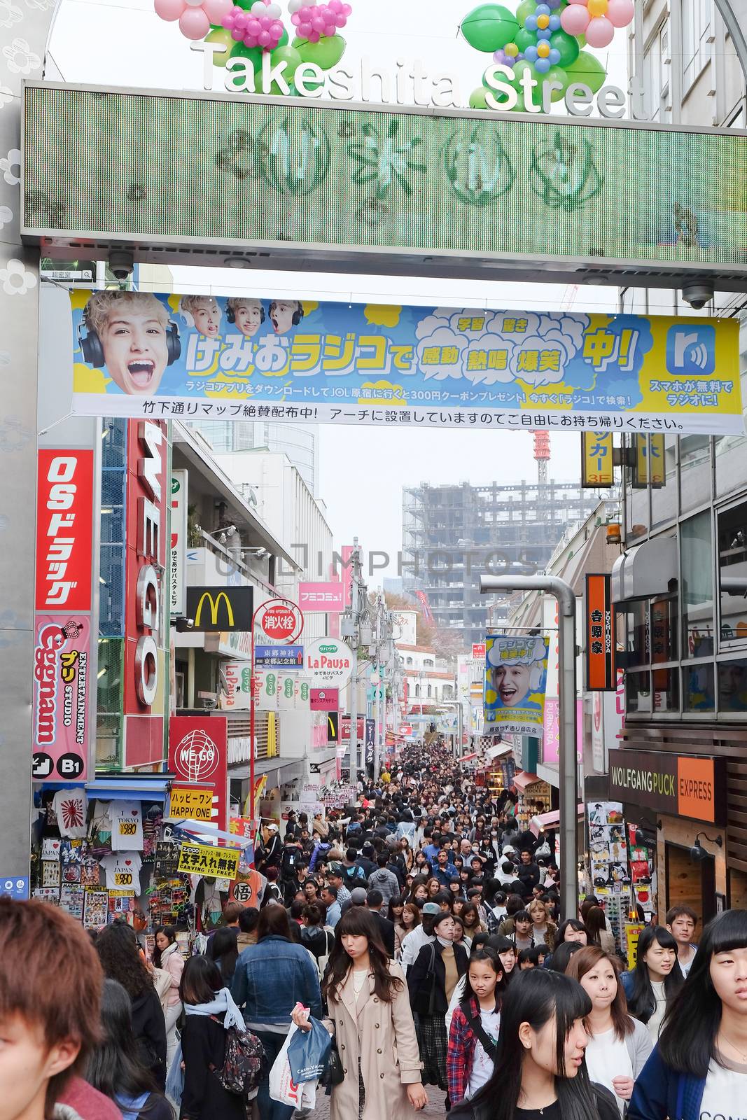 TOKYO, JAPAN - MARCH 30 2016: Takeshita Street(Takeshita Dori) in Harajuku. Takeshita Dori is considered a birthplace of Japan's fashion trends.