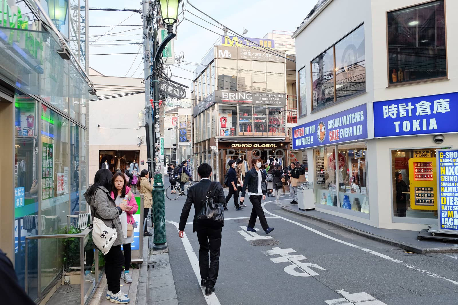 TOKYO JAPAN - March 30, 2016: People in Ura-Harajuku street. The area is world-famouse as the centre of fashion and culture for Japanese youth.