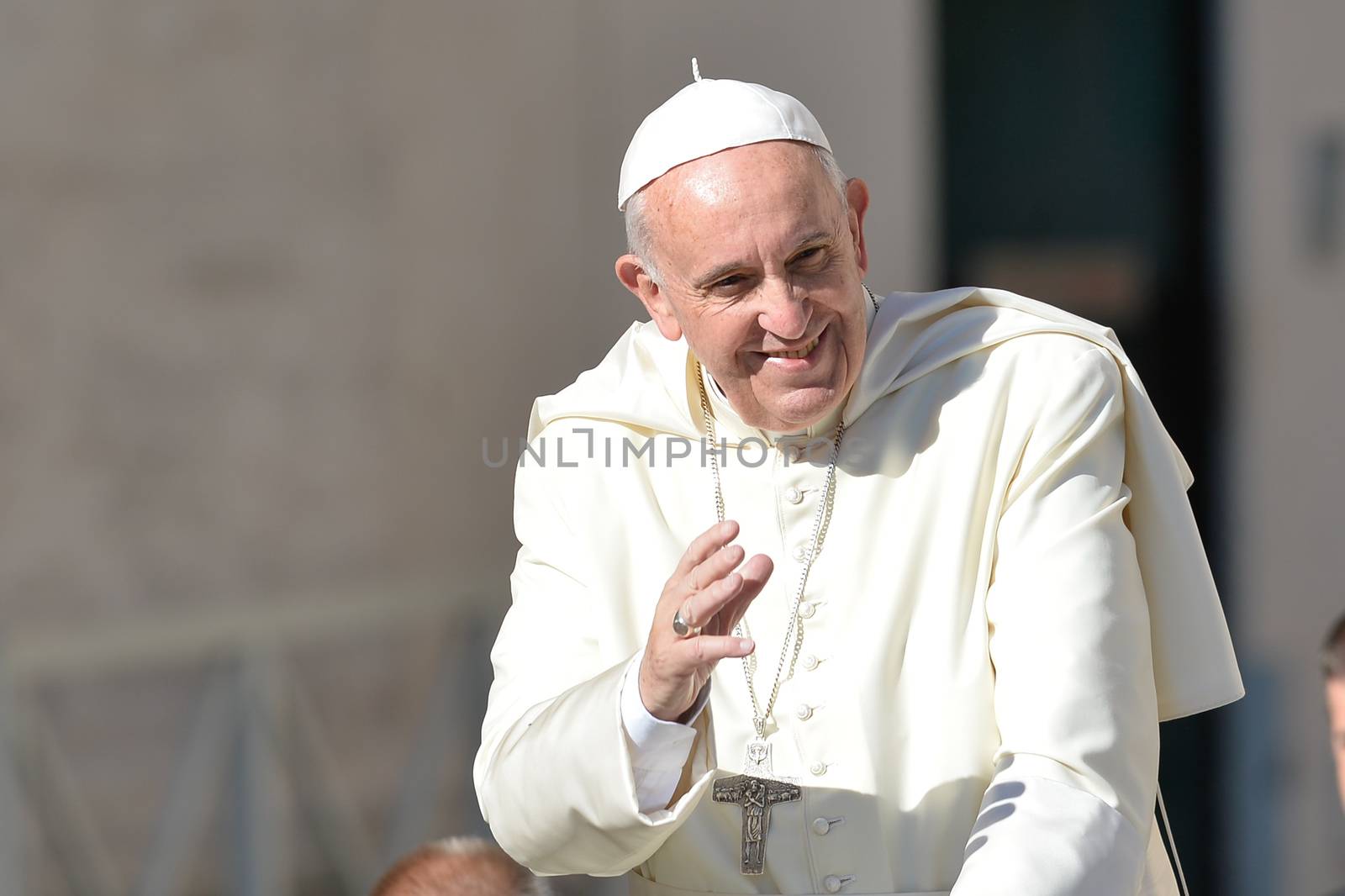 VATICAN: Pope Francis greets the crowd during his weekly general audience at St Peter's square on April 20, 2016 in Vatican. 