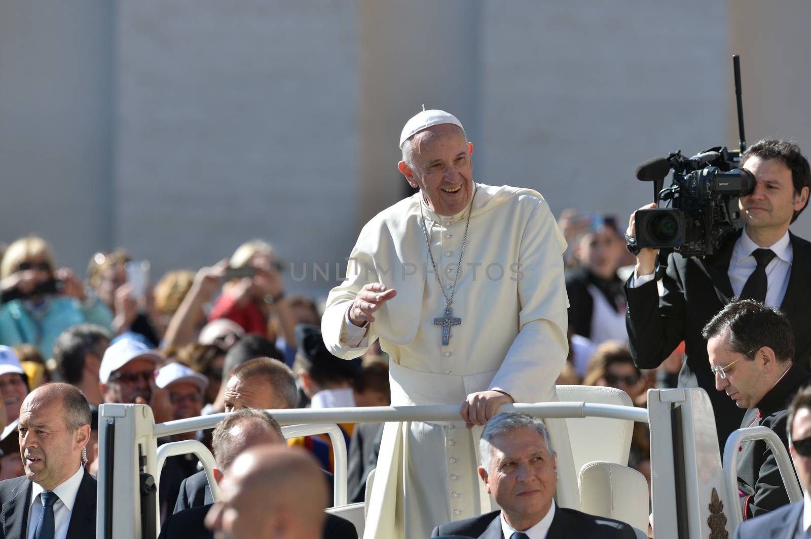 VATICAN: Pope Francis greets the crowd during his weekly general audience at St Peter's square on April 20, 2016 in Vatican. 