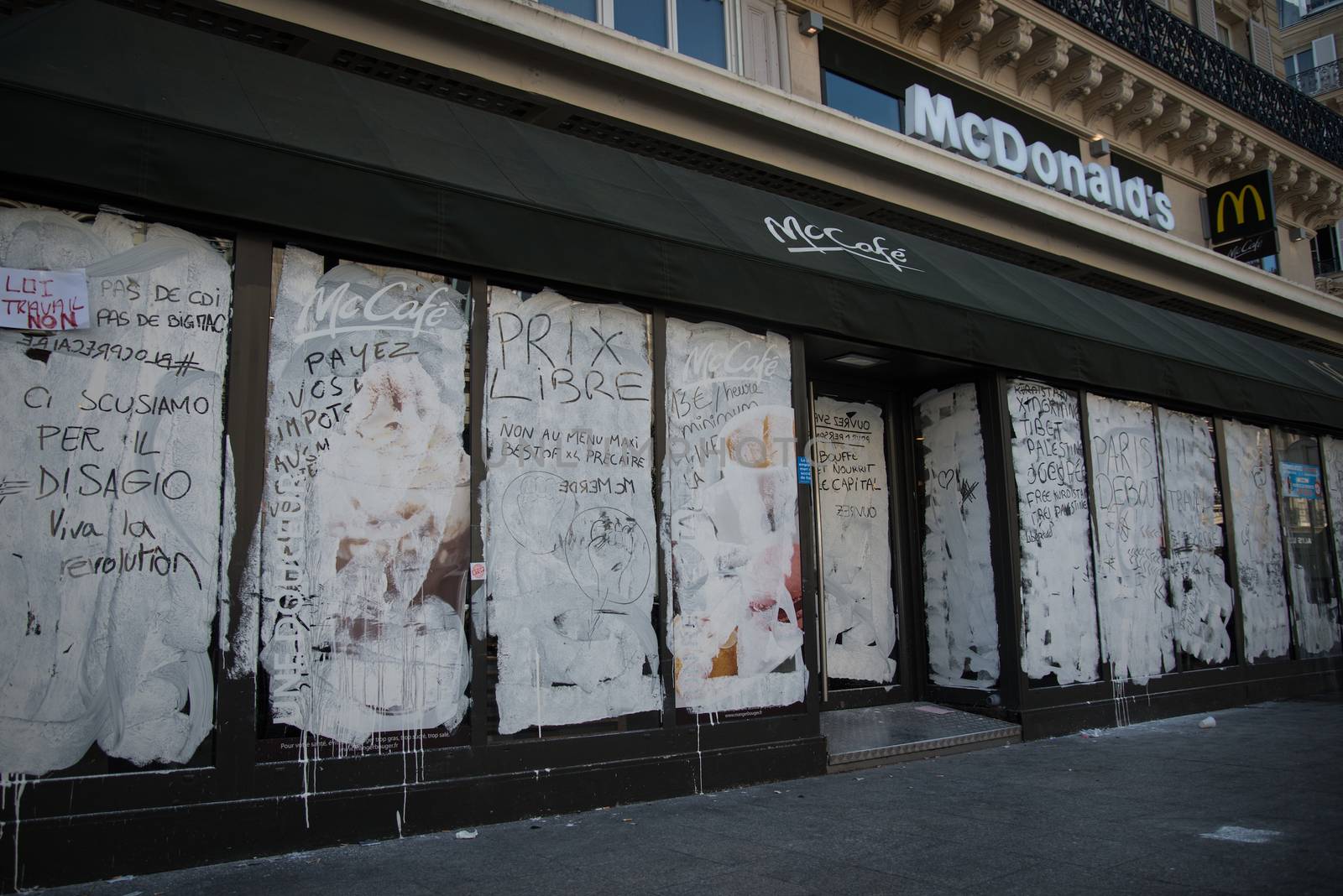FRANCE, Paris : This picture shows a damaged Mcdonald's restaurant near gare du Nord, in Paris, on April 20, 2016 after a protest against split shifts and to demand wage increases in front of fast food restaurants.