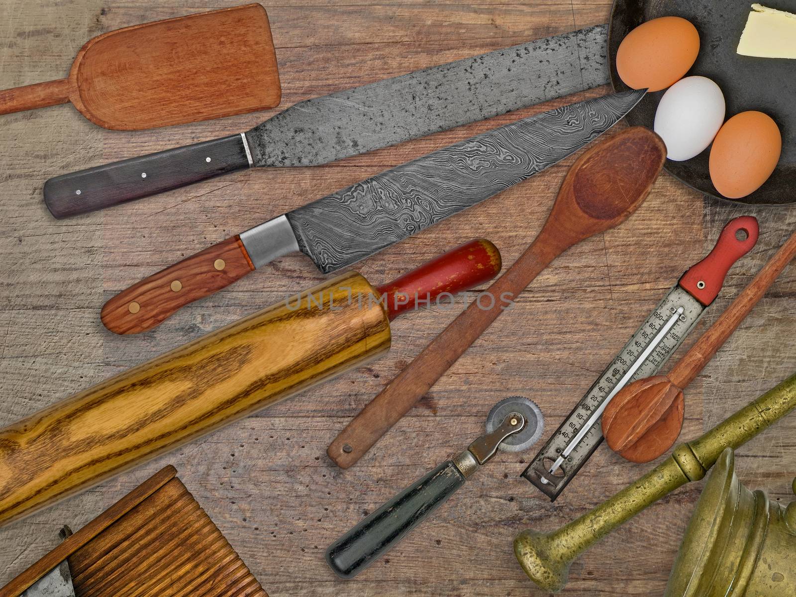 vintage bakery shop tools and utensils over stained wooden table