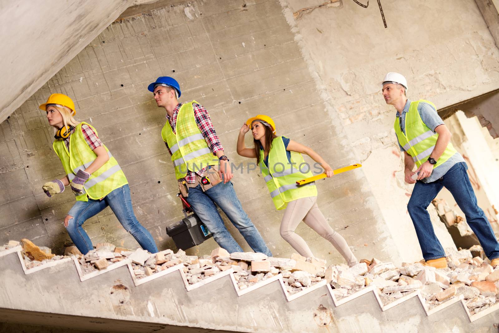 Four construction architects in building damaged in the disaster.