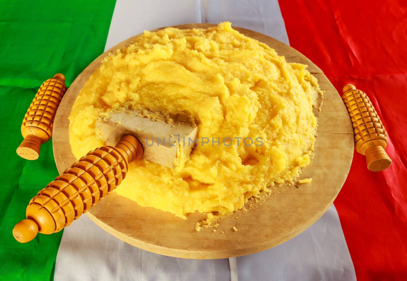 a cutting-board with hot polenta ready to eat