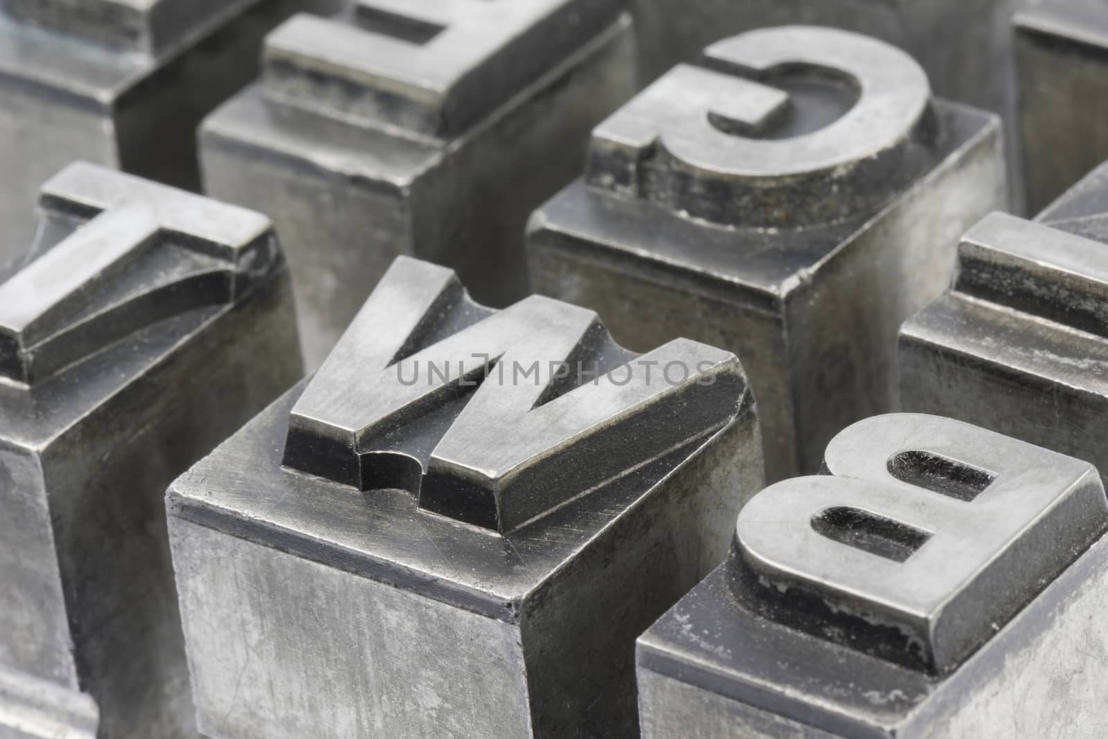 Old lead ink printing type from a book printing company. Historical metal letters from an old printing machine. Created and used in Netherlands in the middle of the last century.
