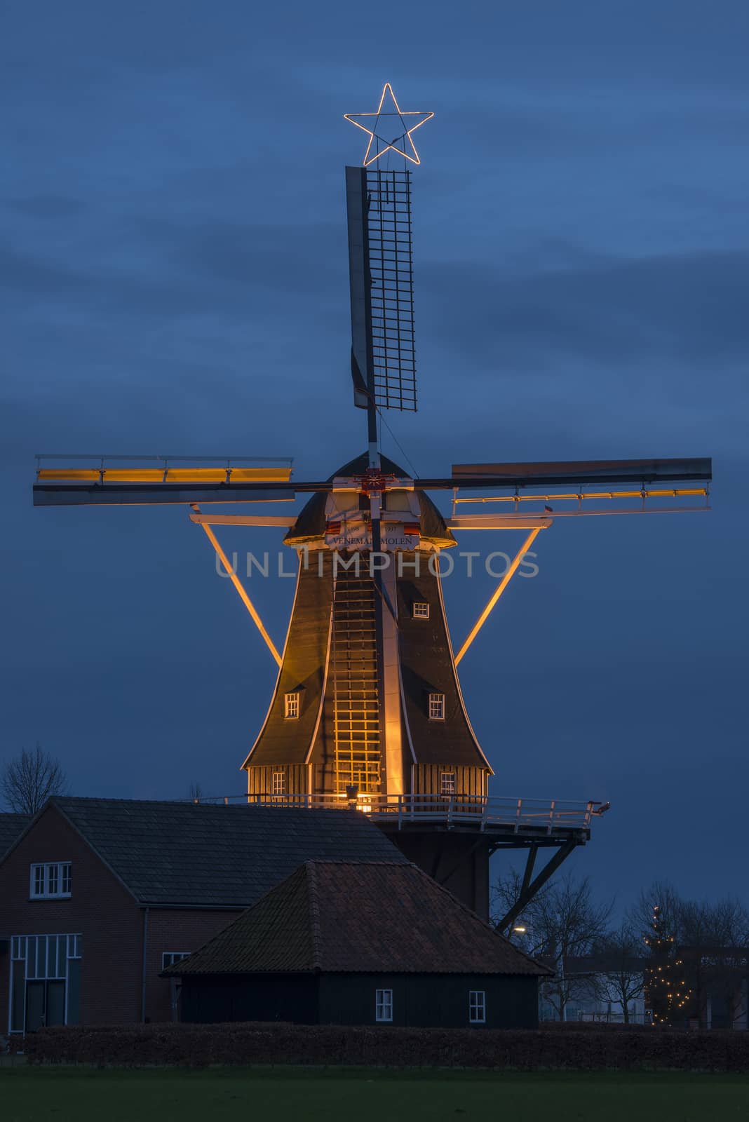 Authentic renovated windmill in Winterswijk in the east of the Netherlands in special illumination
