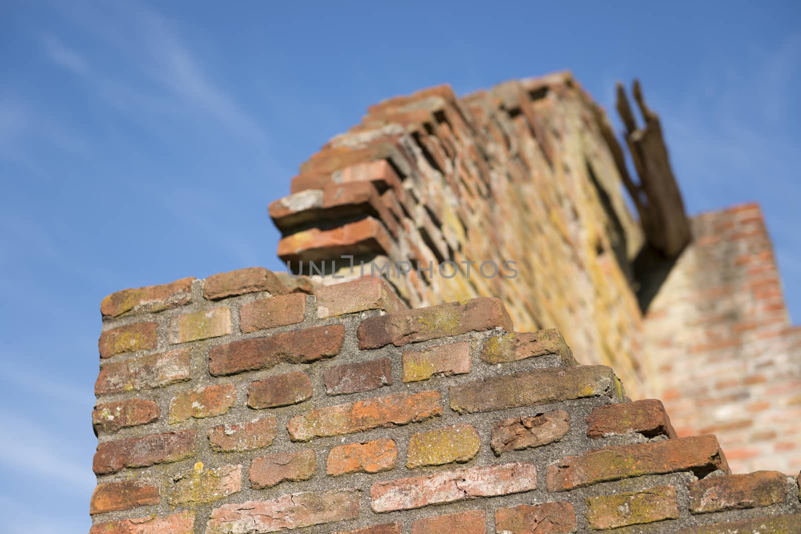 Detail of old colorful masonry in a historic ruin 
