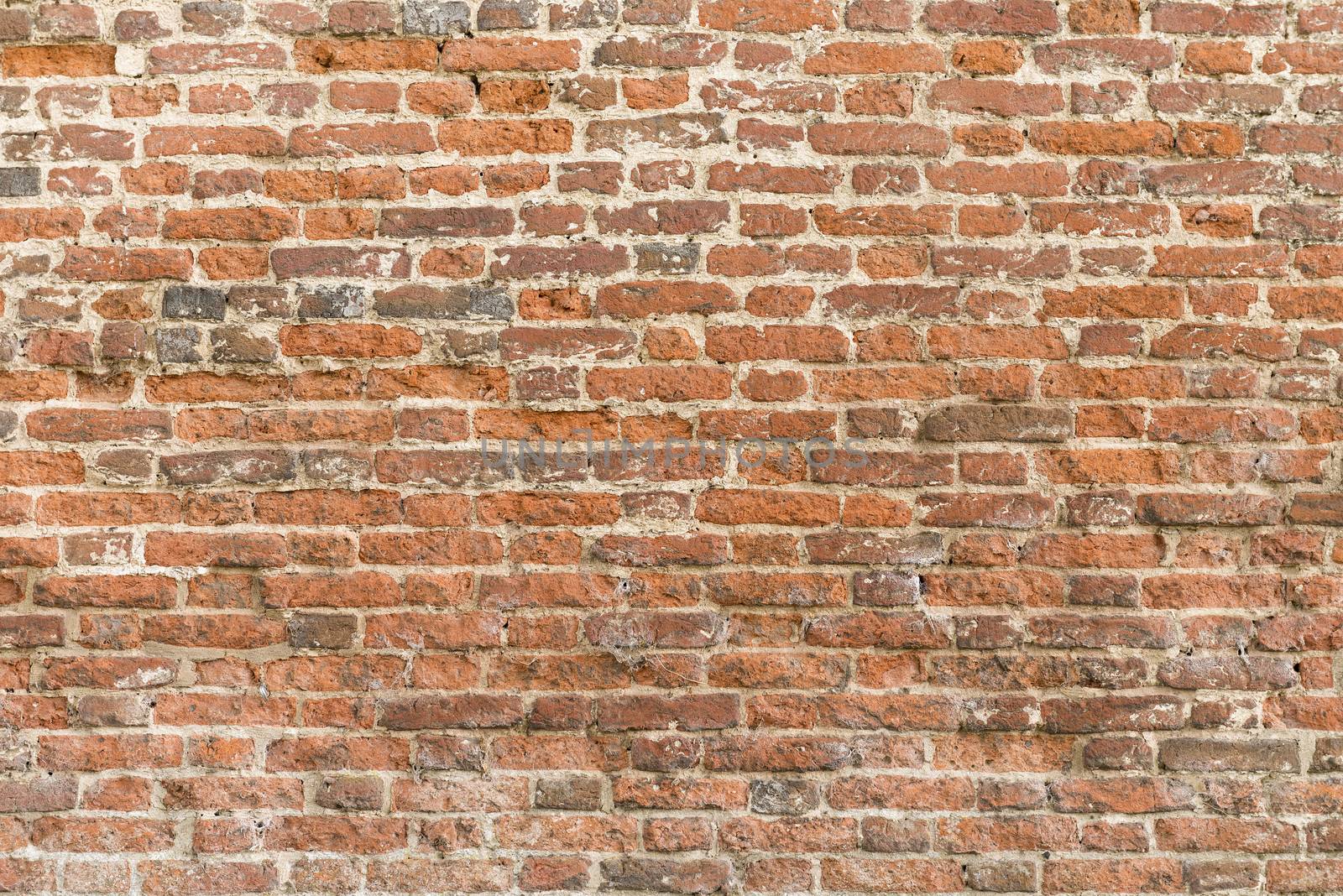 Masonry in an old fortress wall as background
