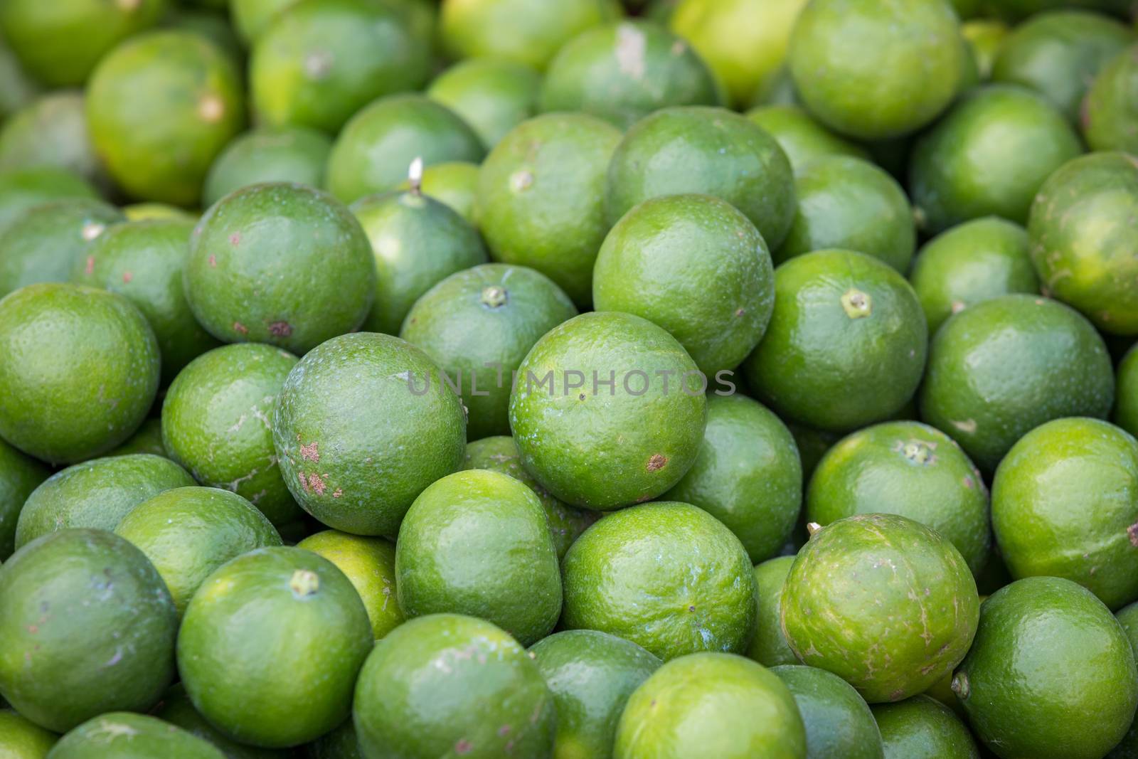 close up of green lime in the supermarket